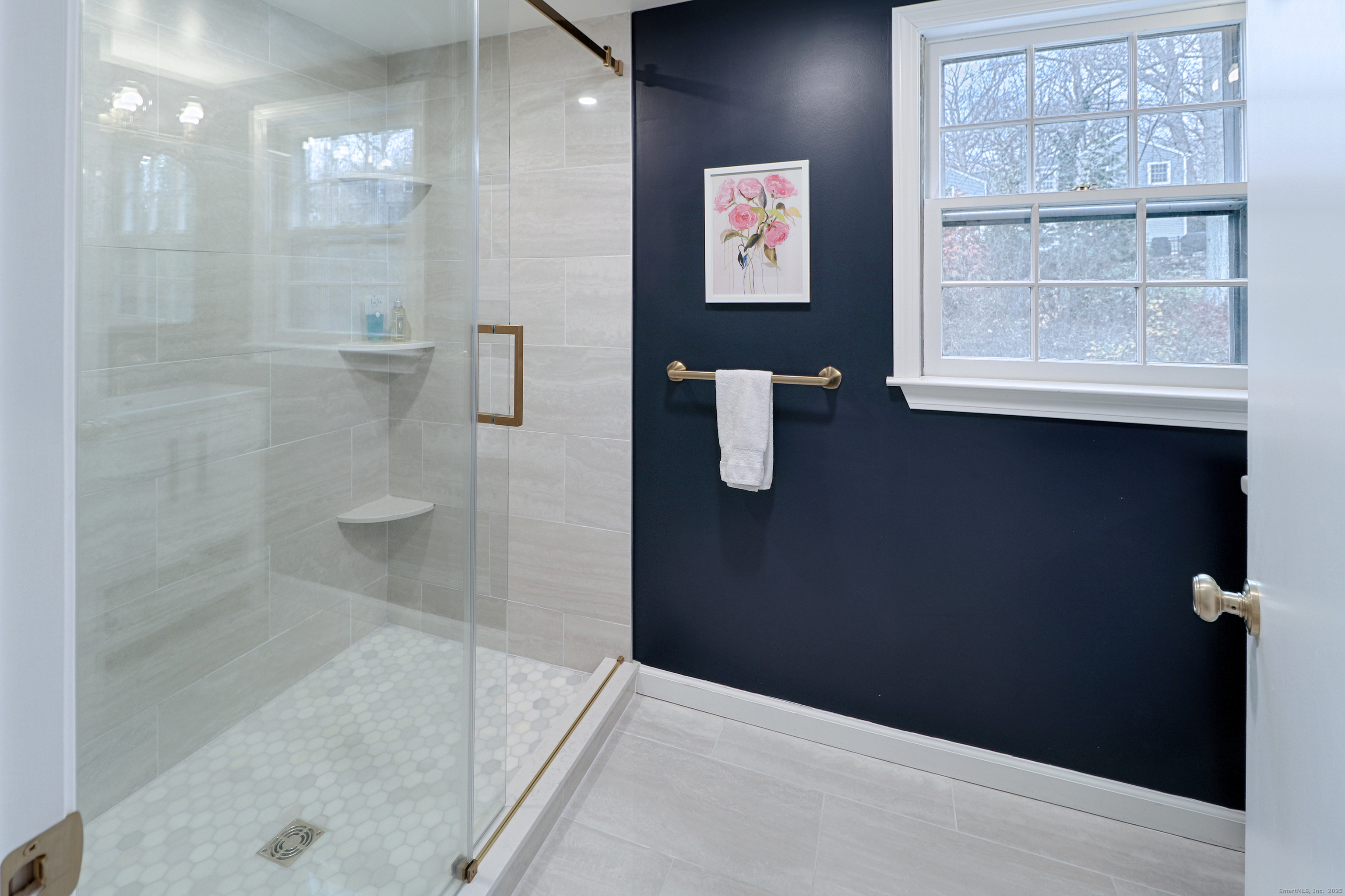 30 Falmouth Road Fairfield, CT 06825 - Photo 23 of 37 a bathroom with a bathtub and a shower