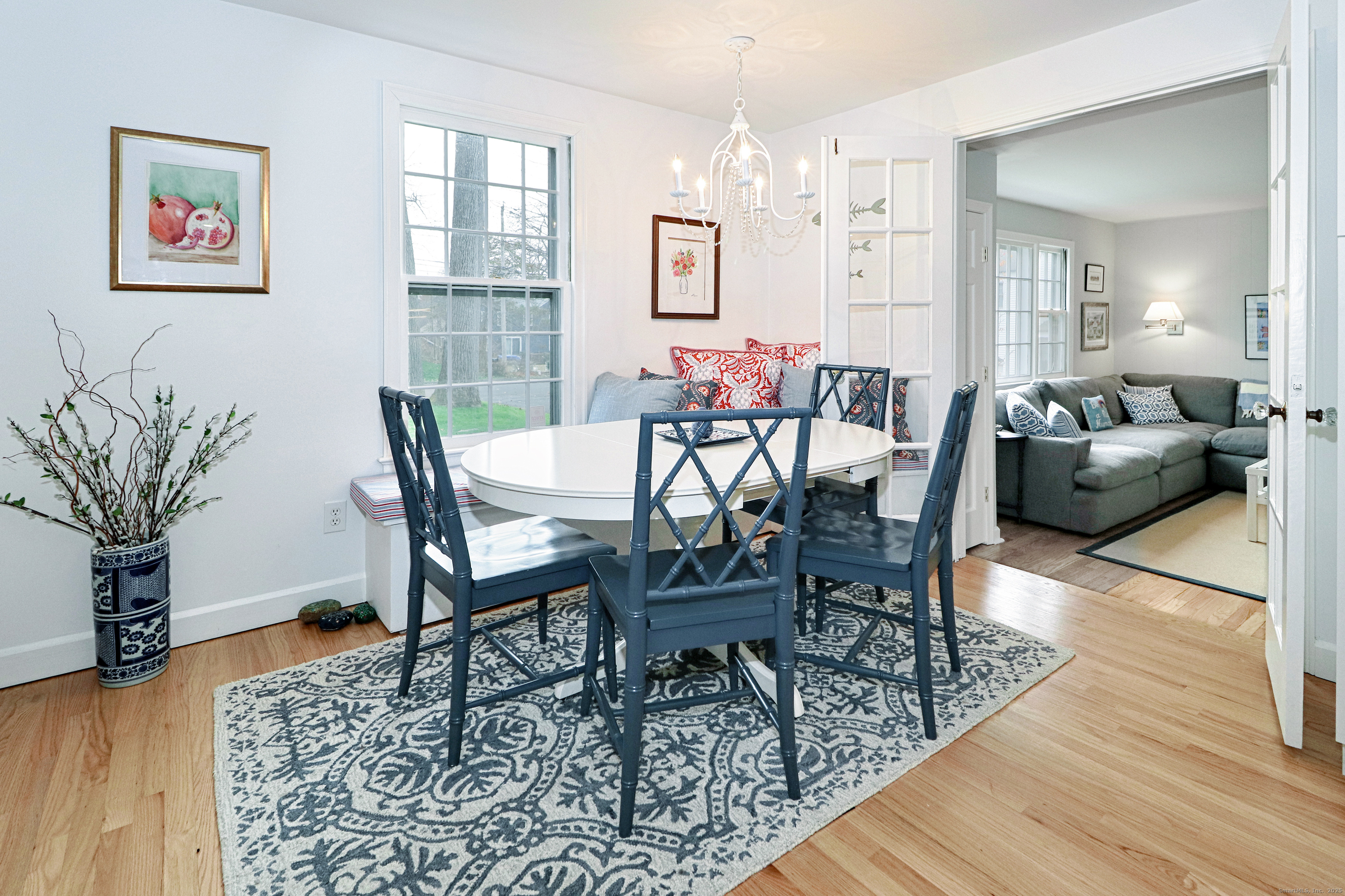 30 Falmouth Road Fairfield, CT 06825 - Photo 10 of 37 a view of a dining room with furniture and wooden floor