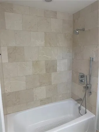 a close up of a bathtub in a bathroom