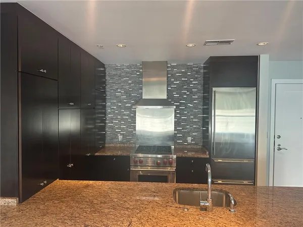 a bathroom with mirror