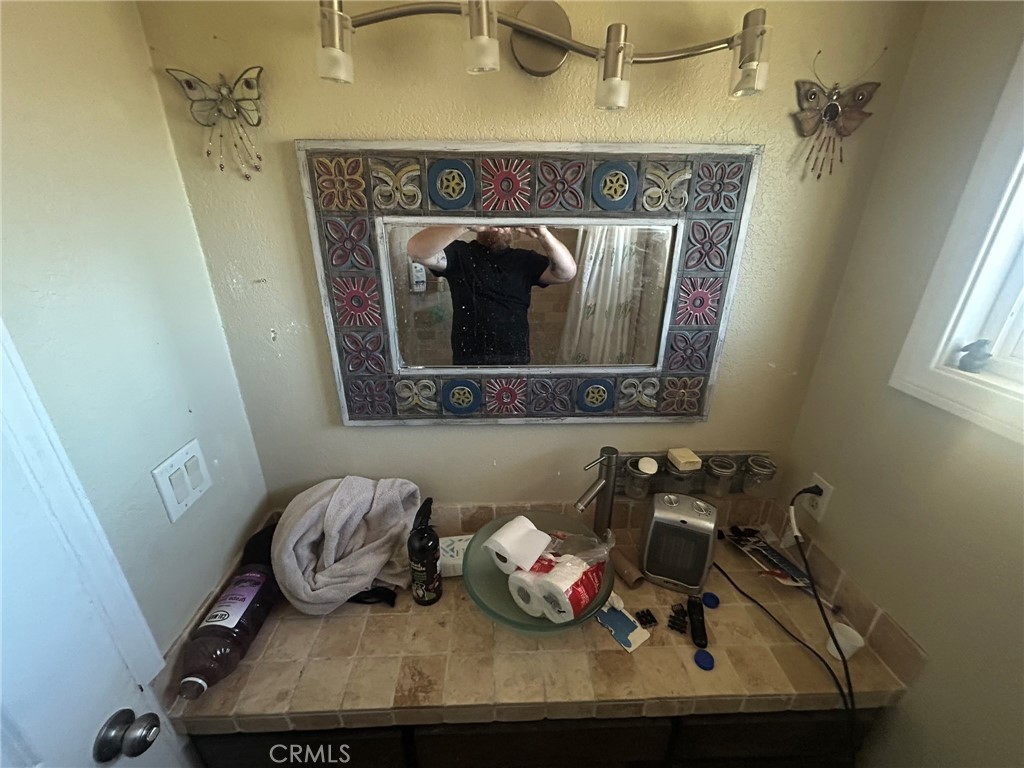 1749 Valley View Ridgecrest, CA 93555 - Photo 15 of 22 a living room with furniture and a fireplace