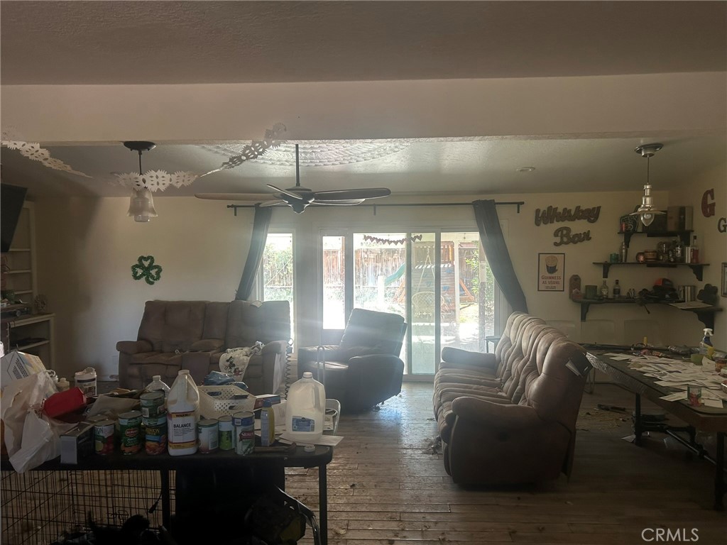 1749 Valley View Ridgecrest, CA 93555 - Photo 7 of 22 a living room with furniture and wooden floor