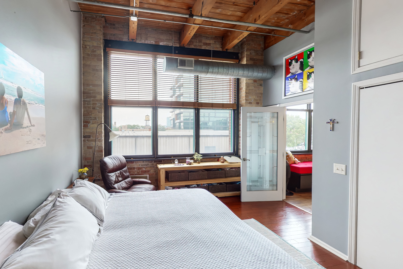 312 North May Street, Unit 3F Chicago, IL 60607 - Photo 13 of 25 a bedroom with a bed and large windows