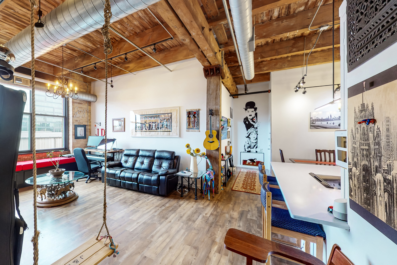 312 North May Street, Unit 3F Chicago, IL 60607 - Photo 7 of 25 a living room with furniture and wooden floor