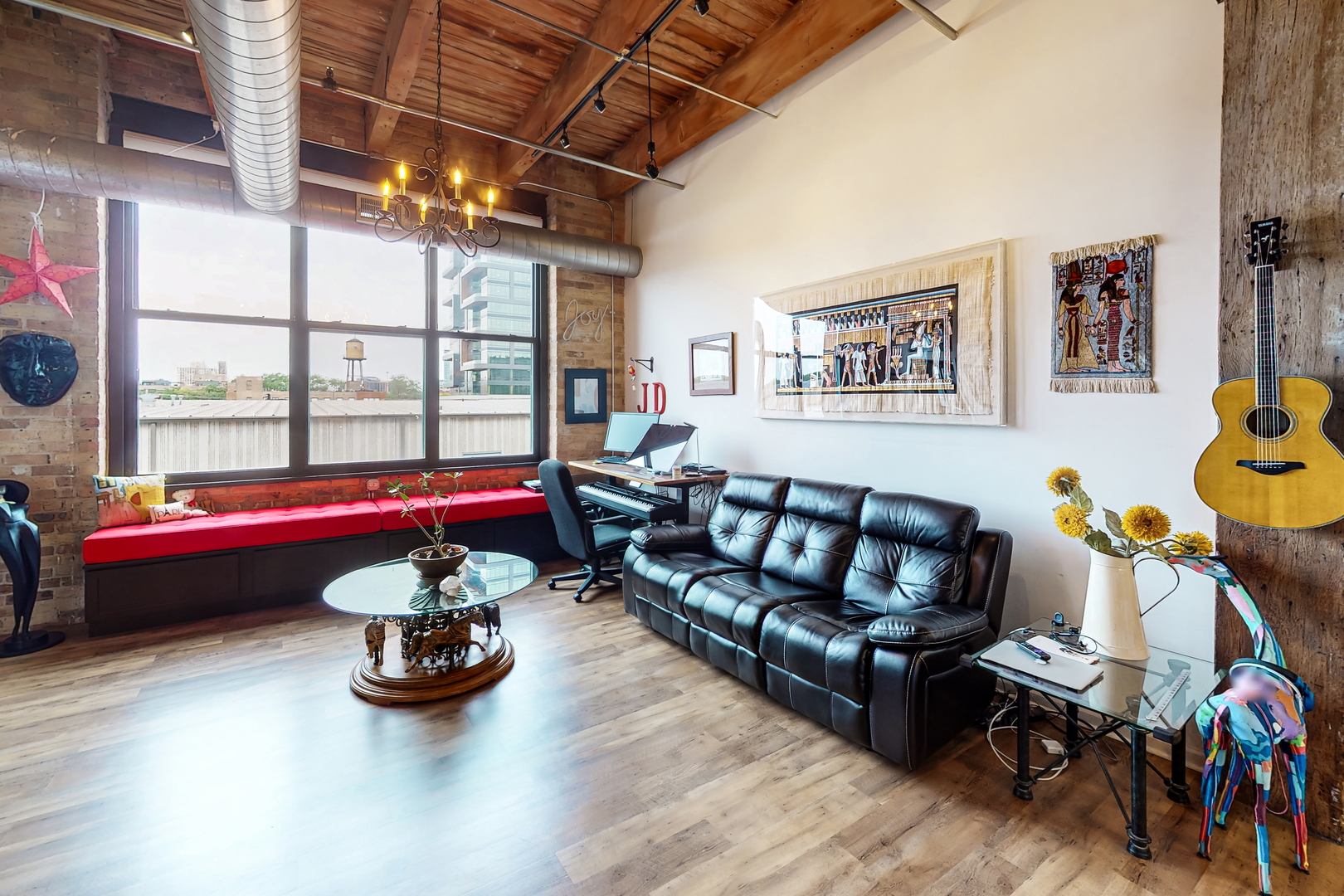 312 North May Street, Unit 3F Chicago, IL 60607 - Photo 9 of 25 a living room with furniture and a wooden floor