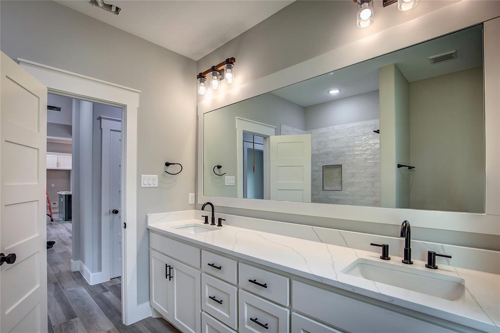 405 Door Key Ranch Road Trinidad, TX 75163 - Photo 16 of 28 Bathroom with dual vanity and hardwood / wood-style flooring
