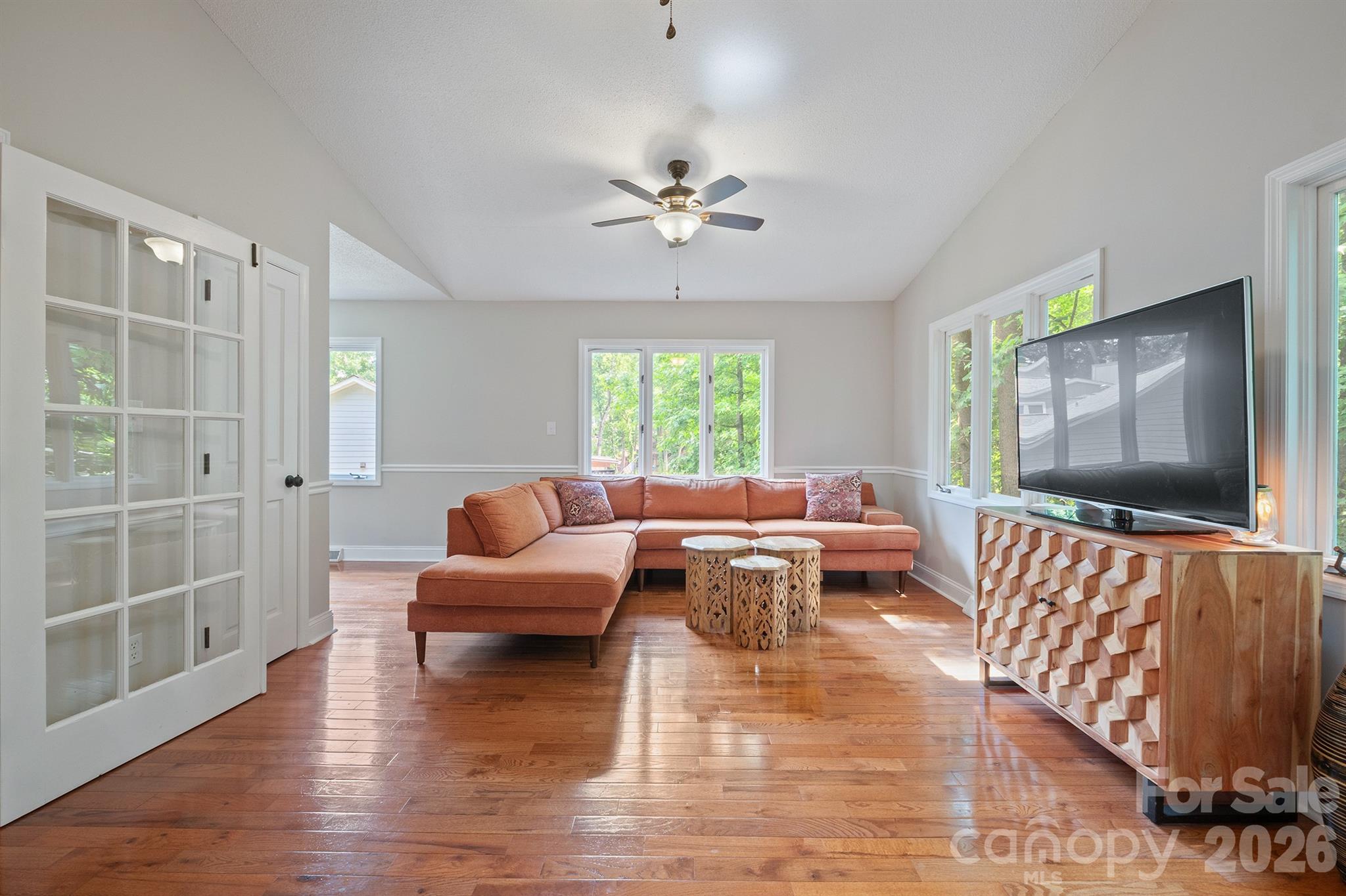 19017 Kailua Circle Tega Cay, SC 29708 - Photo 20 of 46 a living room with furniture and a flat screen tv