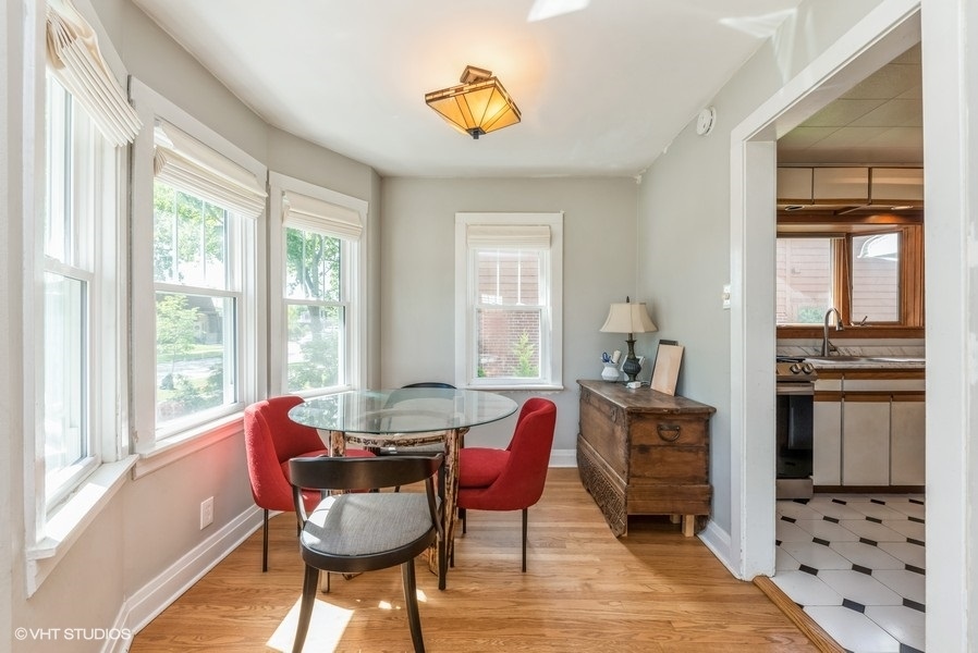 1112 Potter Road Park Ridge, IL 60068 - Photo 4 of 12 a dining room with furniture and window