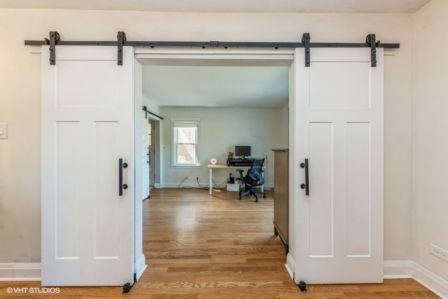 1112 Potter Road Park Ridge, IL 60068 - Photo 6 of 12 a view of a livingroom with furniture and a hallway
