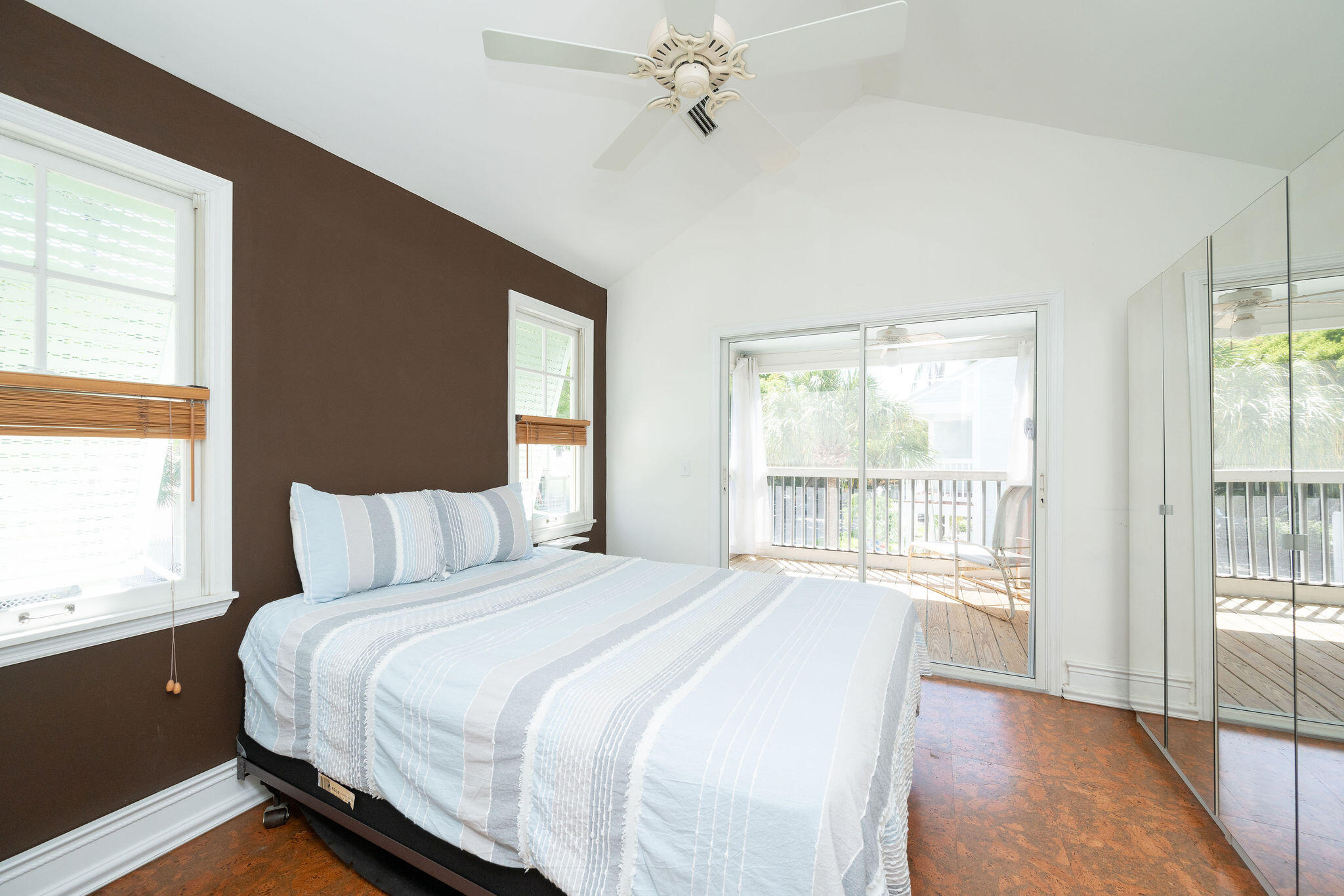 1 Spoonbill Way Key West, FL 33040 - Photo 18 of 38 a bedroom with a large bed and a large window