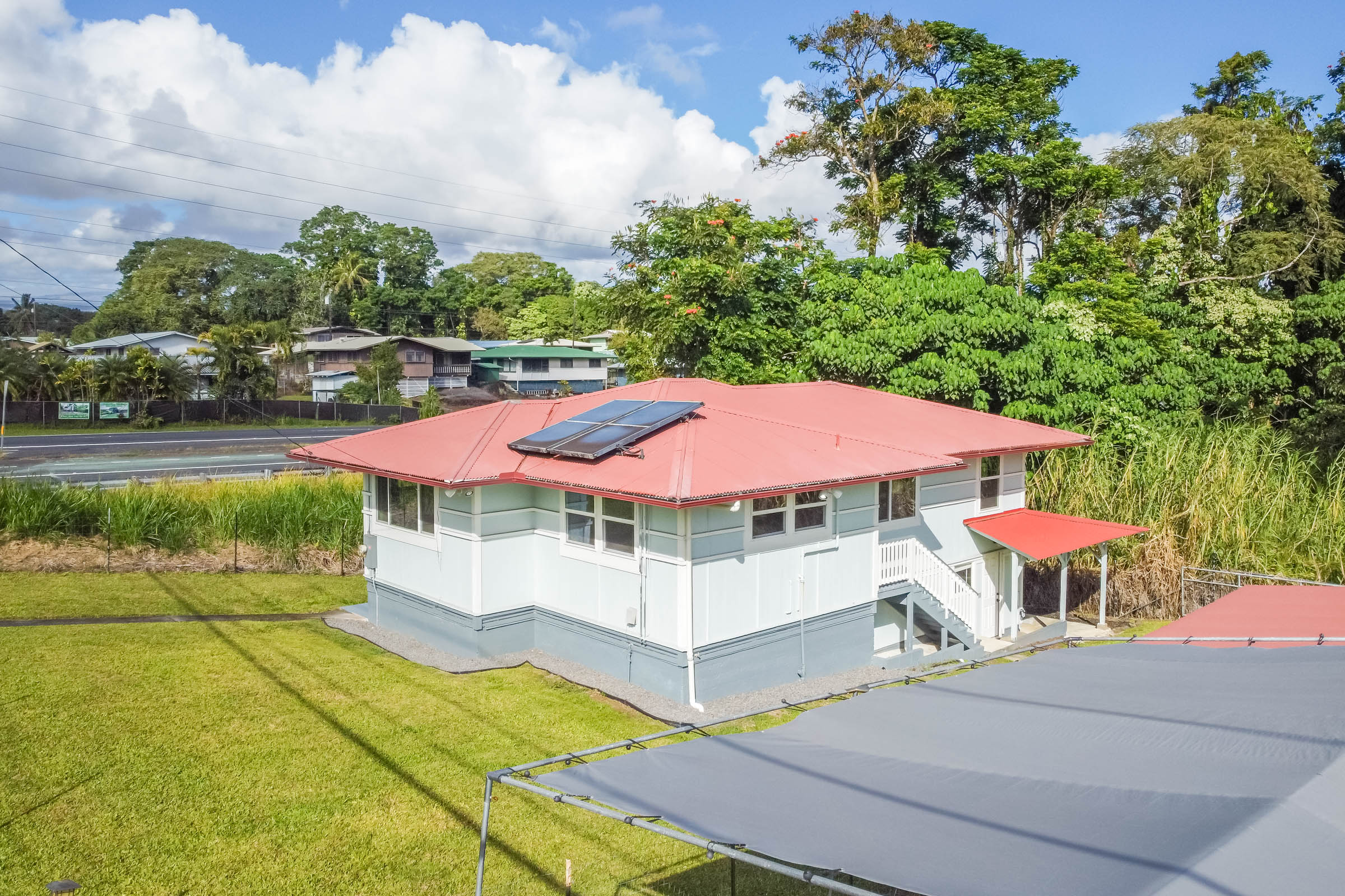 75 East Palai Street Hilo, HI 96720 - Photo 20 of 29 an outdoor space with pool and furniture