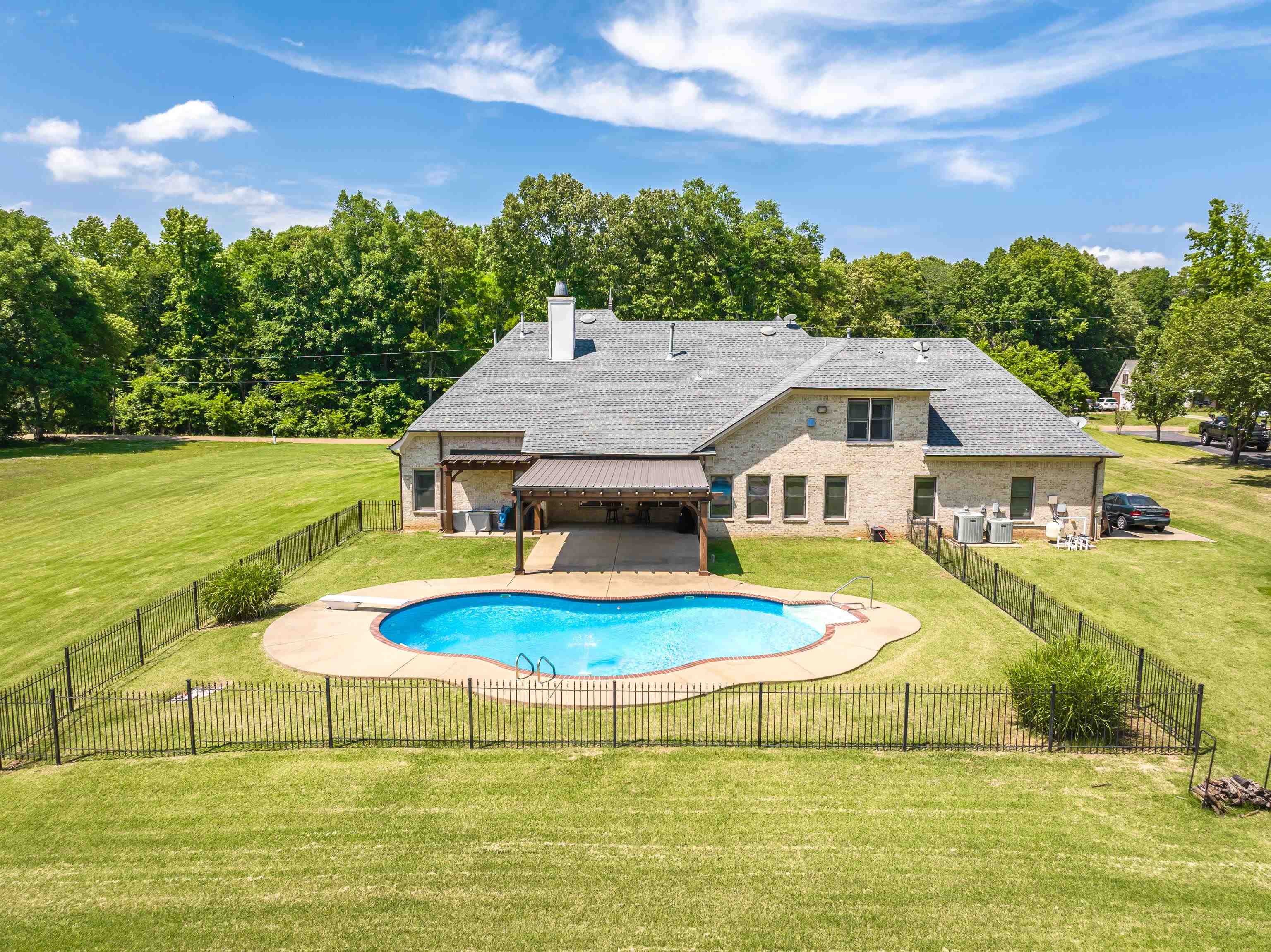 9028 Osborntown Road Arlington, TN 38002 - Photo 37 of 40 a aerial view of a house with swimming pool and an outdoor seating