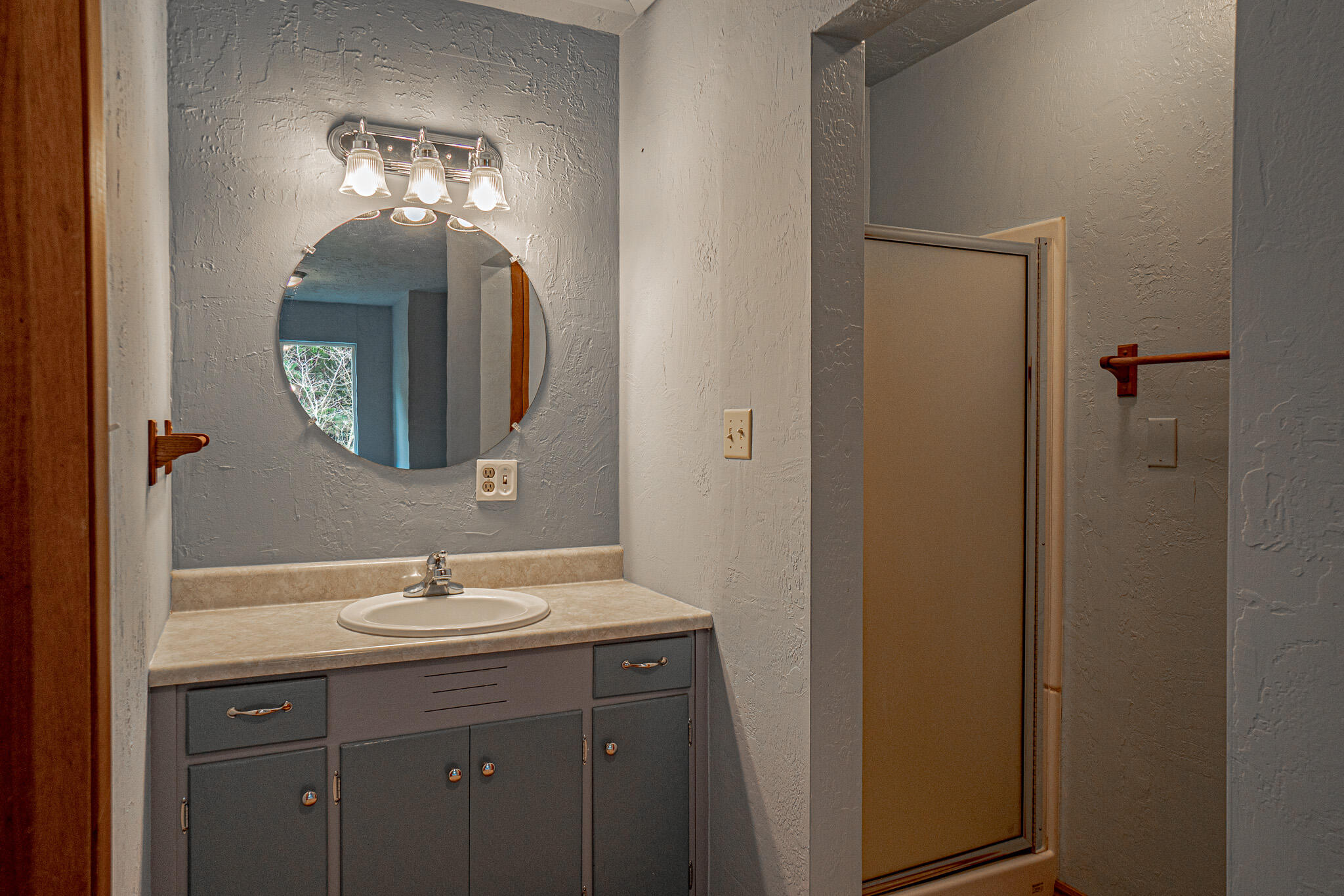 2728 Anderson Creek Road Talent, OR 97540 - Photo 22 of 45 a bathroom with a double vanity sink and a mirror