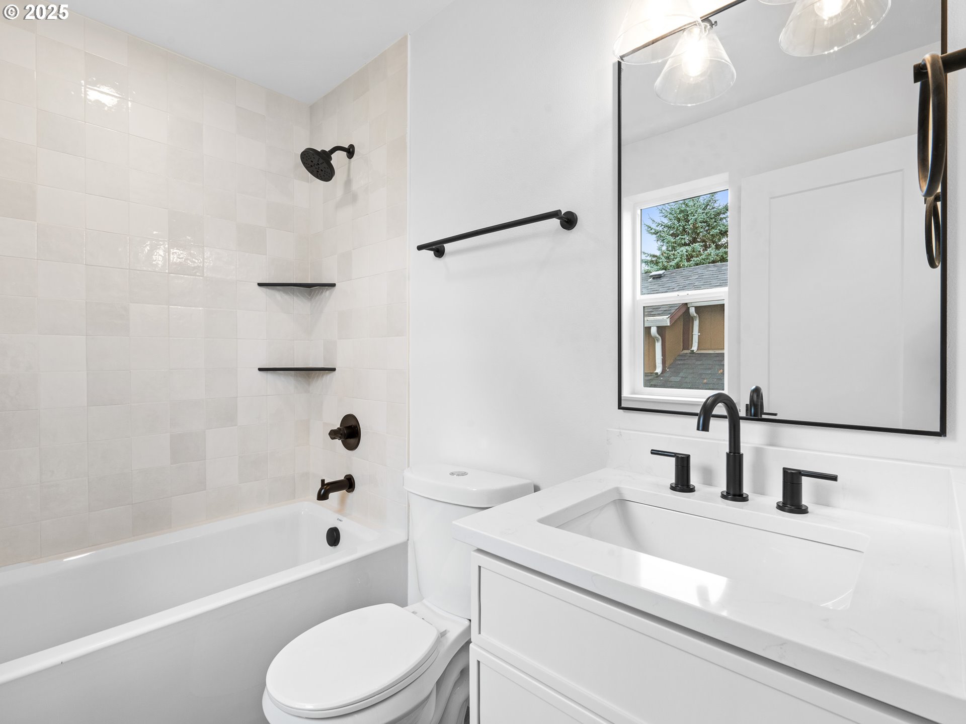 8420 Southeast Clay Street Portland, OR 97216 - Photo 11 of 16 a bathroom with a sink a toilet and shower