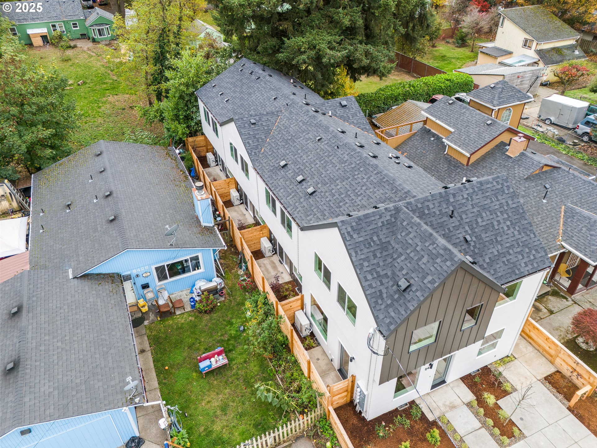 8420 Southeast Clay Street Portland, OR 97216 - Photo 15 of 16 an aerial view of a house with a yard and lake view
