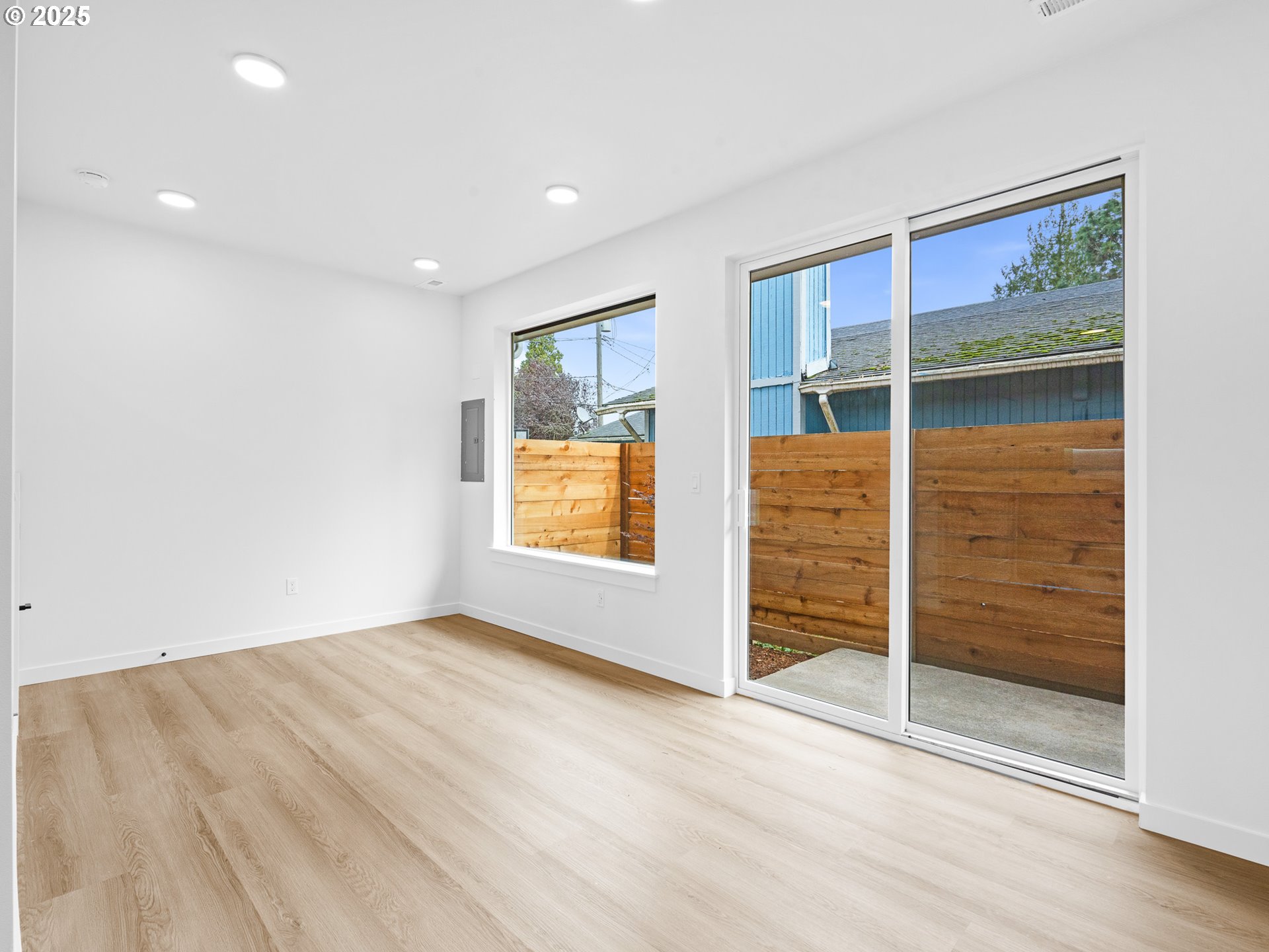8420 Southeast Clay Street Portland, OR 97216 - Photo 7 of 16 an empty room with walk in closet and window