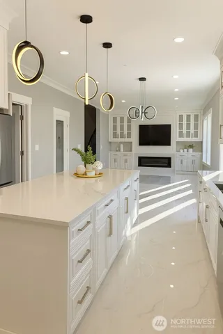 a bathroom with double vanity and a sink