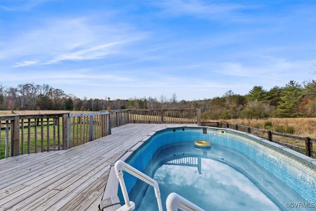 21 Old 15 Road New Canton, VA 23123 - Photo 34 of 49 View of swimming pool featuring a hot tub and a de