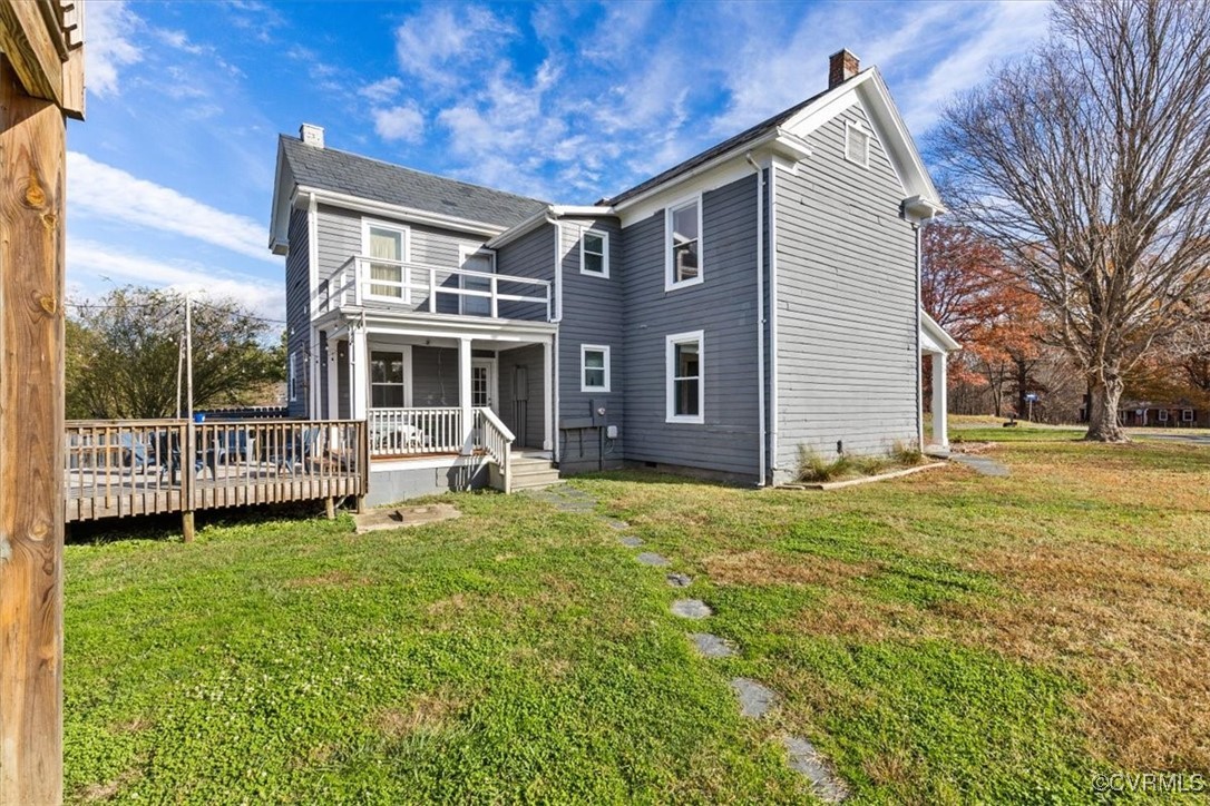 21 Old 15 Road New Canton, VA 23123 - Photo 42 of 49 Back of property with a lawn, a balcony, and a dec