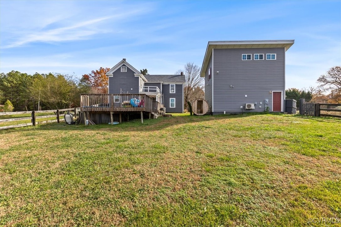 21 Old 15 Road New Canton, VA 23123 - Photo 43 of 49 Back of property with a deck and a lawn