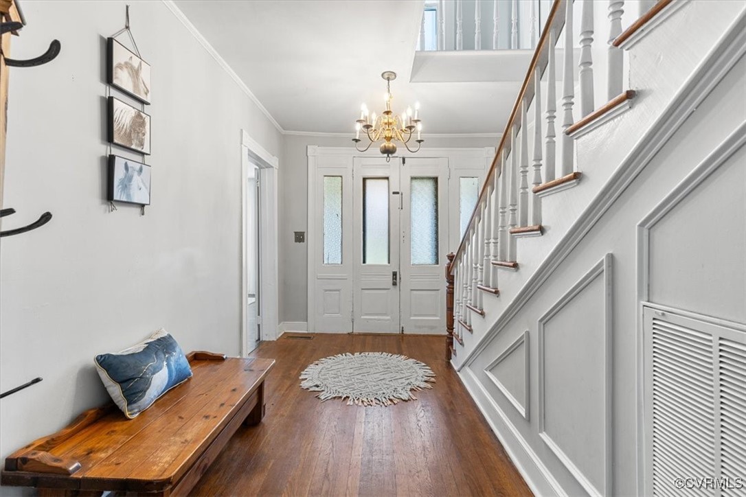 21 Old 15 Road New Canton, VA 23123 - Photo 9 of 49 Entrance foyer featuring a chandelier, crown moldi