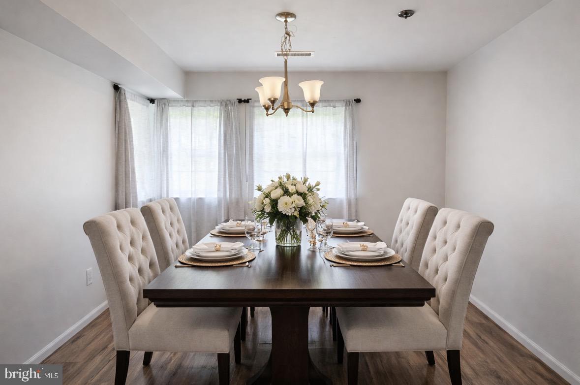 8503 Falls Run Road, Unit B Ellicott City, MD 21043 - Photo 9 of 23 Elegant dining space with natural light.