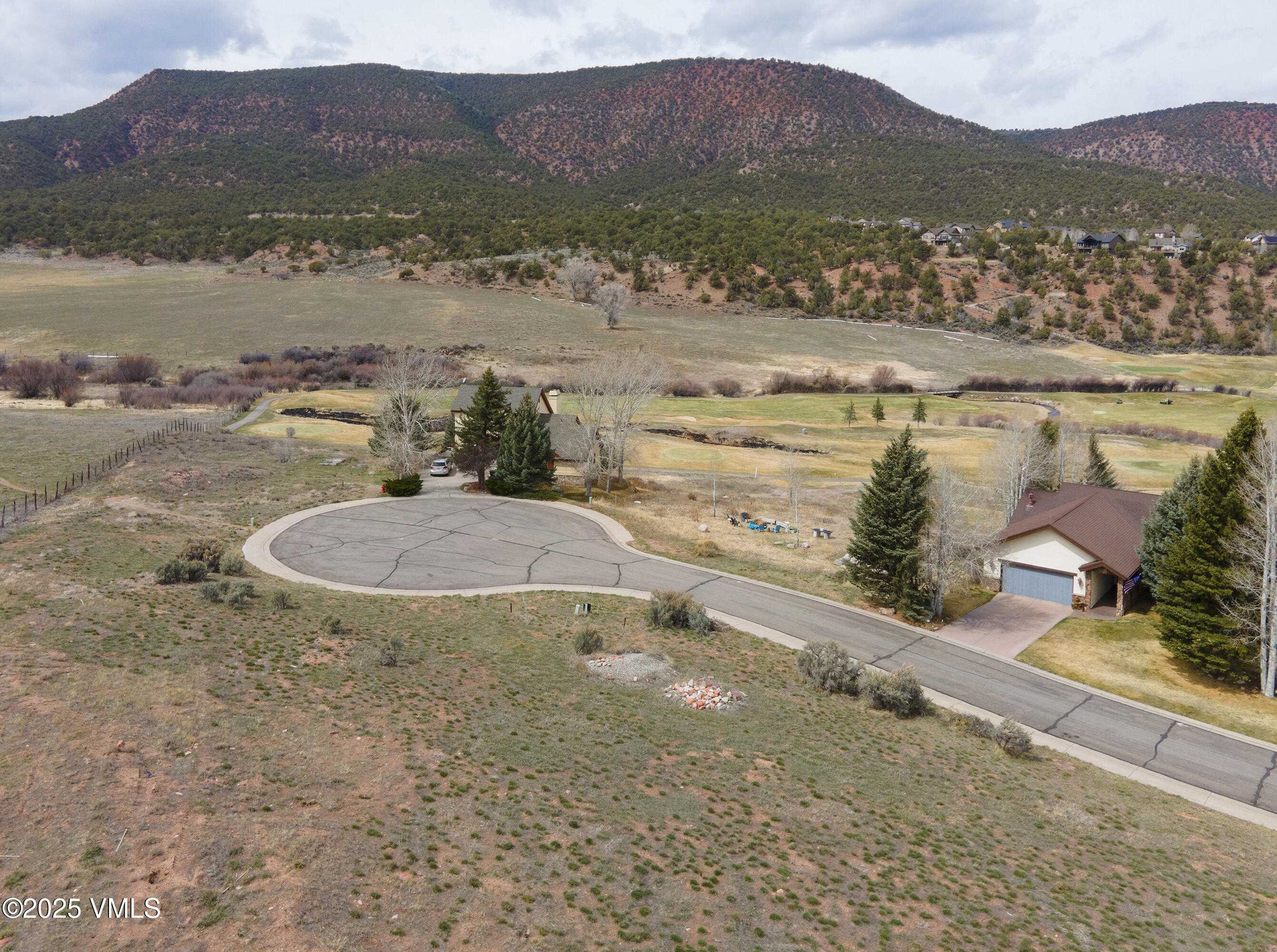 405 Red Fox Gypsum, CO 81637 - Photo 9 of 12 a view of a lake with mountains in the background