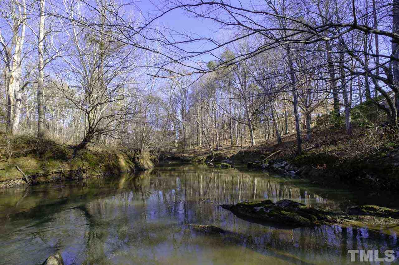 Lot 8 Fork Junction Road Timberlake, NC 27583 - Photo 18 of 30 a backyard of a house with lots of green space