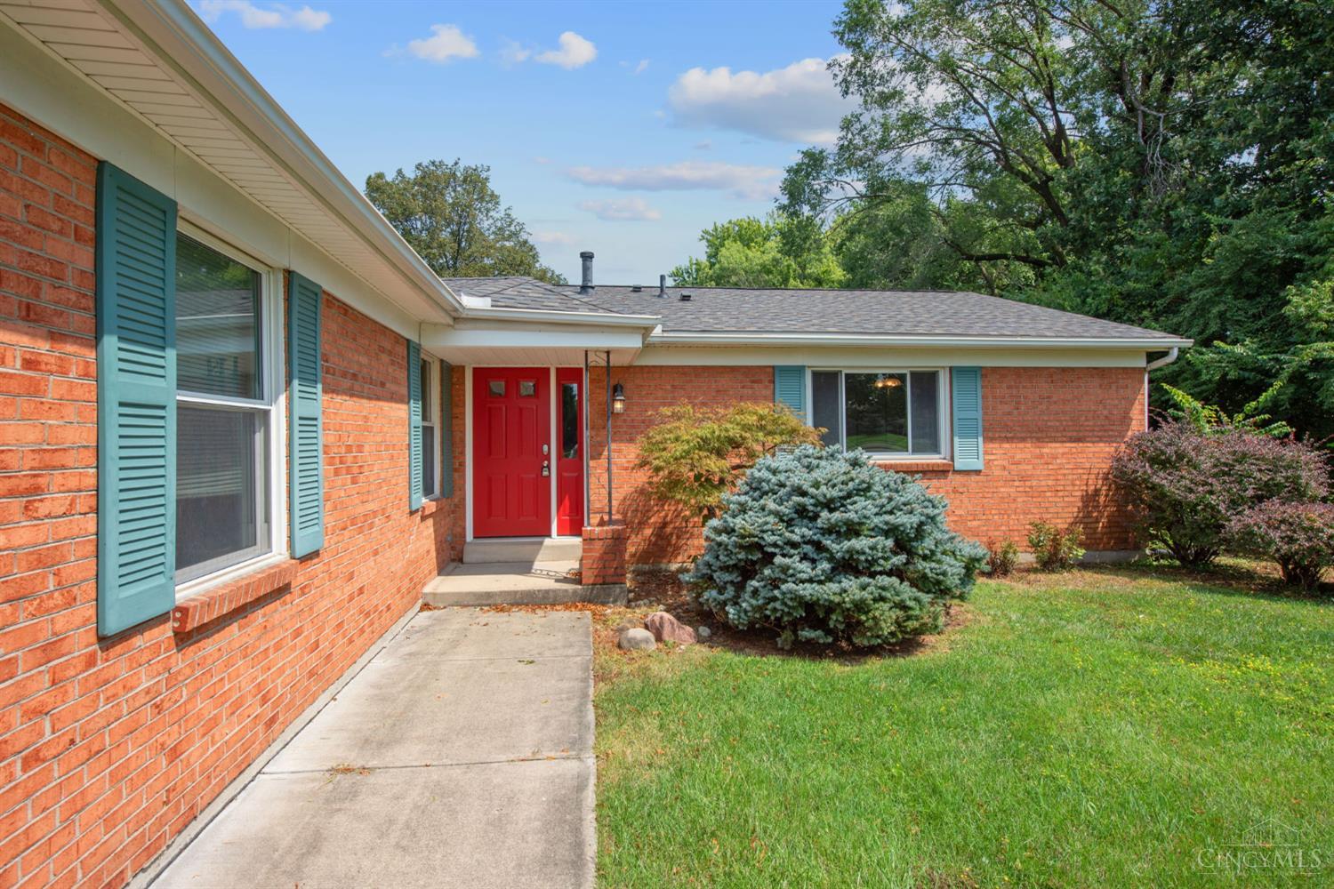 2086 Resor Road Fairfield, OH 45014 - Photo 11 of 42 Attractive front walk leads through refreshed landscaping to the home's distinctive red entry door.