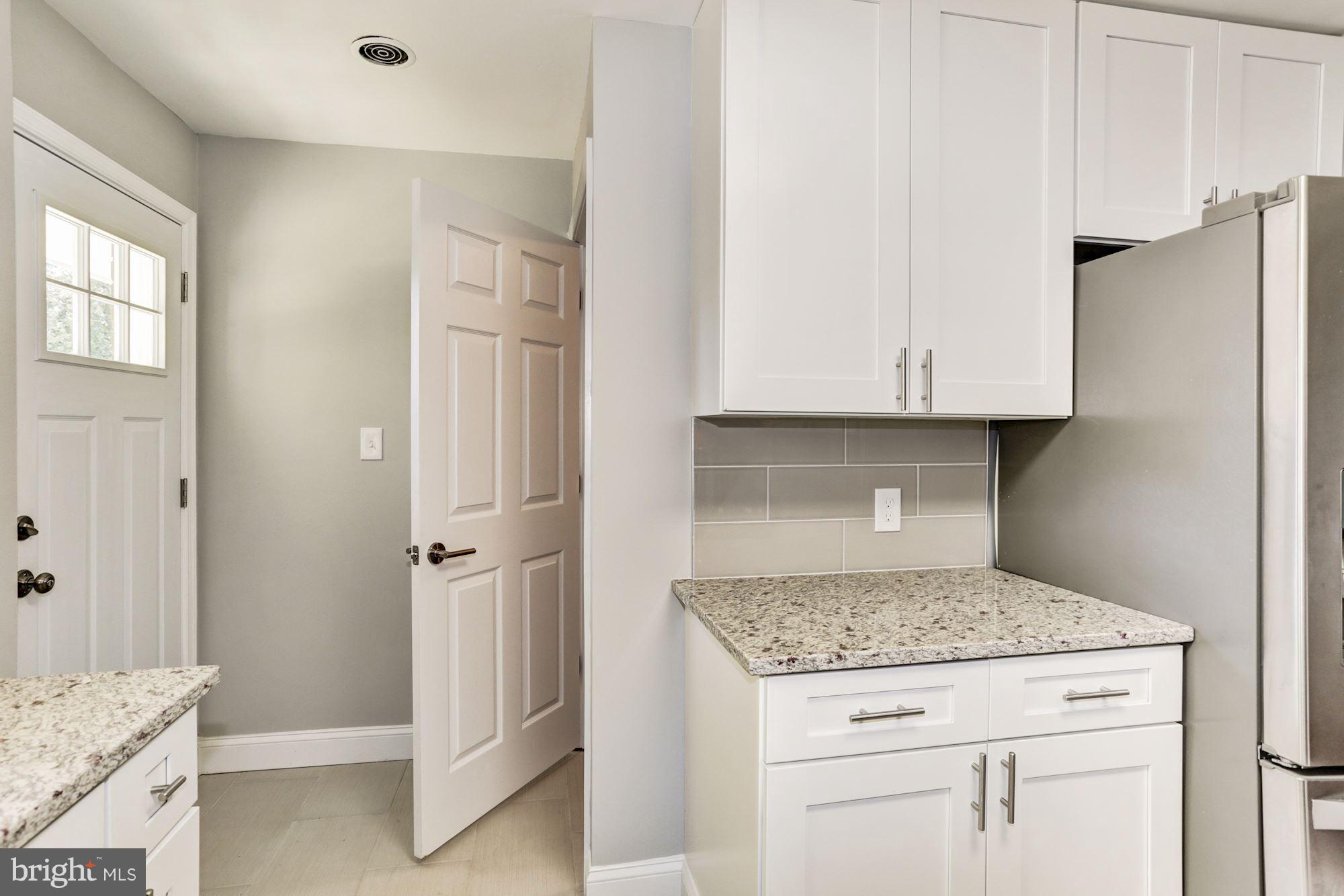 2117 Chapman Road Hyattsville, MD 20783 - Photo 8 of 26 Kitchen with access to lower level
