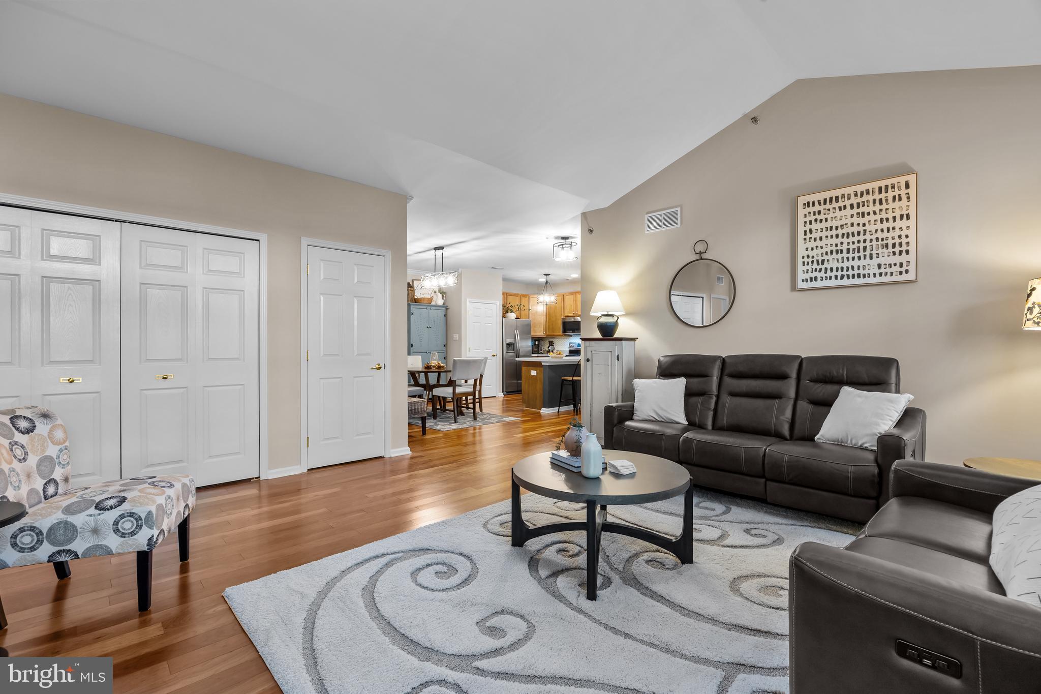 265 Covenant Lane, Unit 8 Harleysville, PA 19438 - Photo 11 of 21 a living room with furniture and wooden floor