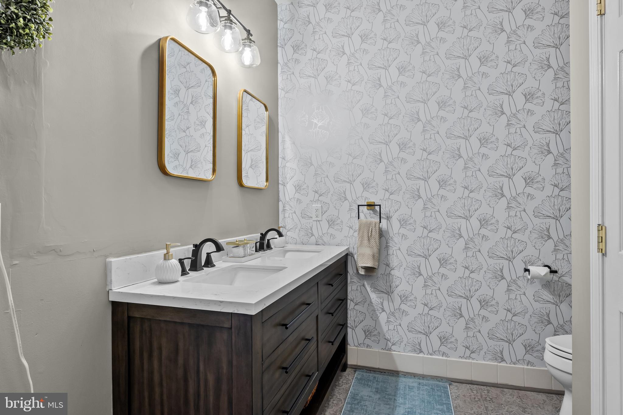 265 Covenant Lane, Unit 8 Harleysville, PA 19438 - Photo 14 of 21 a bathroom with a sink and a mirror