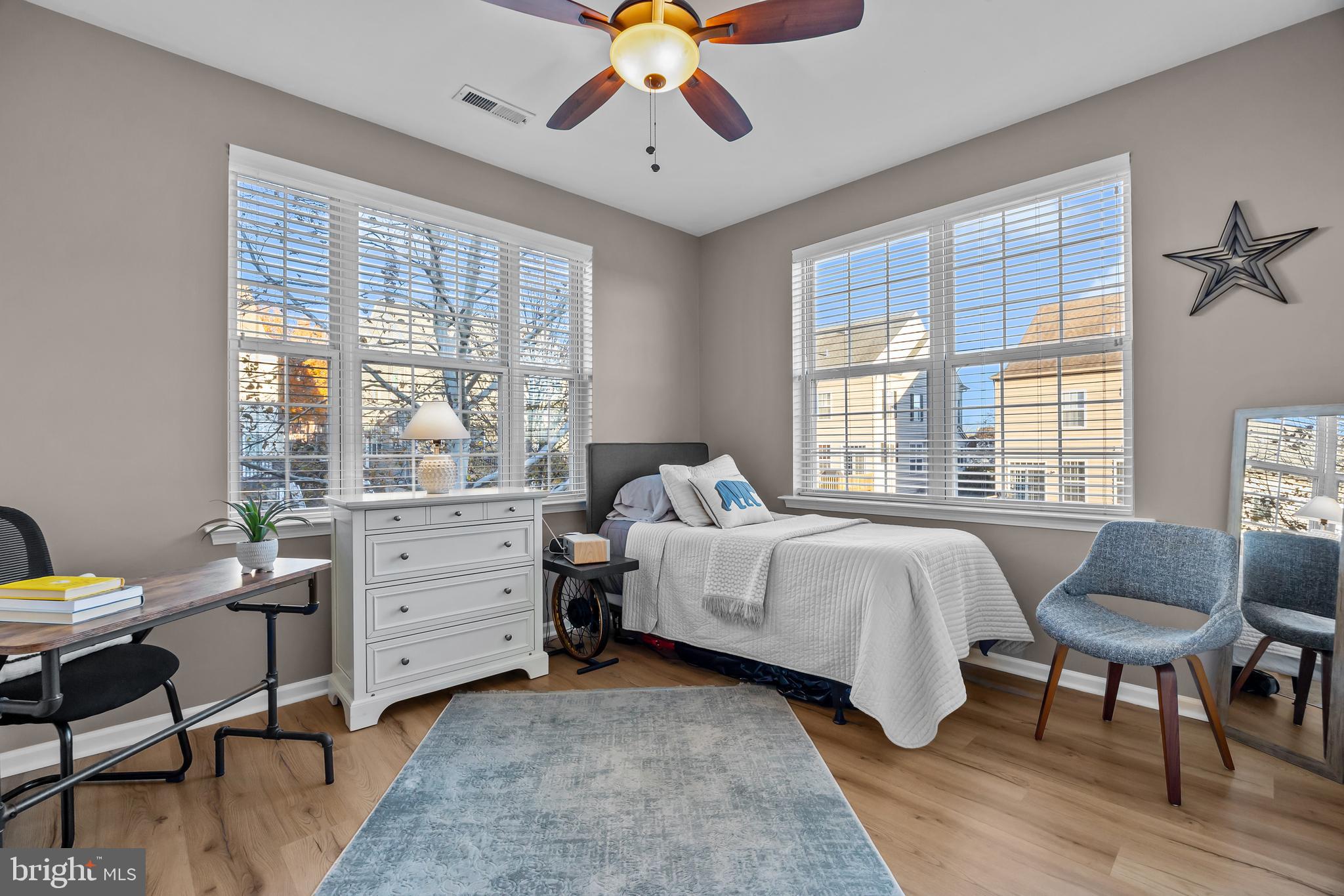 265 Covenant Lane, Unit 8 Harleysville, PA 19438 - Photo 15 of 21 a bed room with a bed and a chair