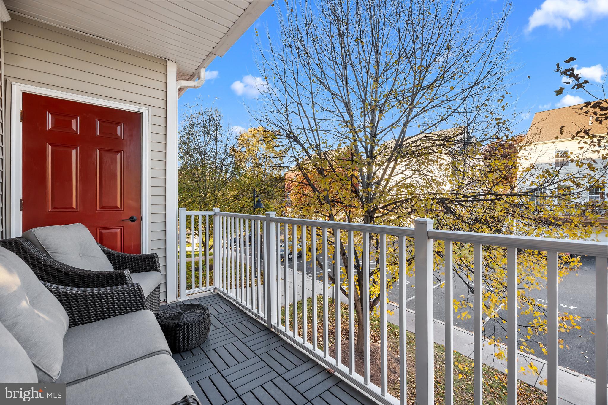 265 Covenant Lane, Unit 8 Harleysville, PA 19438 - Photo 19 of 21 a balcony with furniture and a potted plant