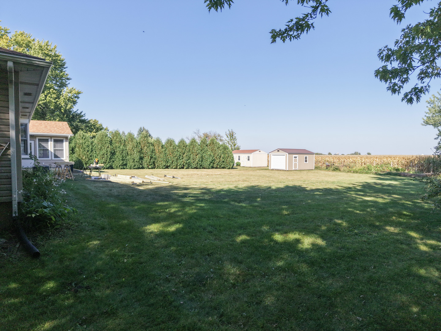 21182 Virginia Road DeKalb, IL 60115 - Photo 36 of 44 a view of a lake with a big yard
