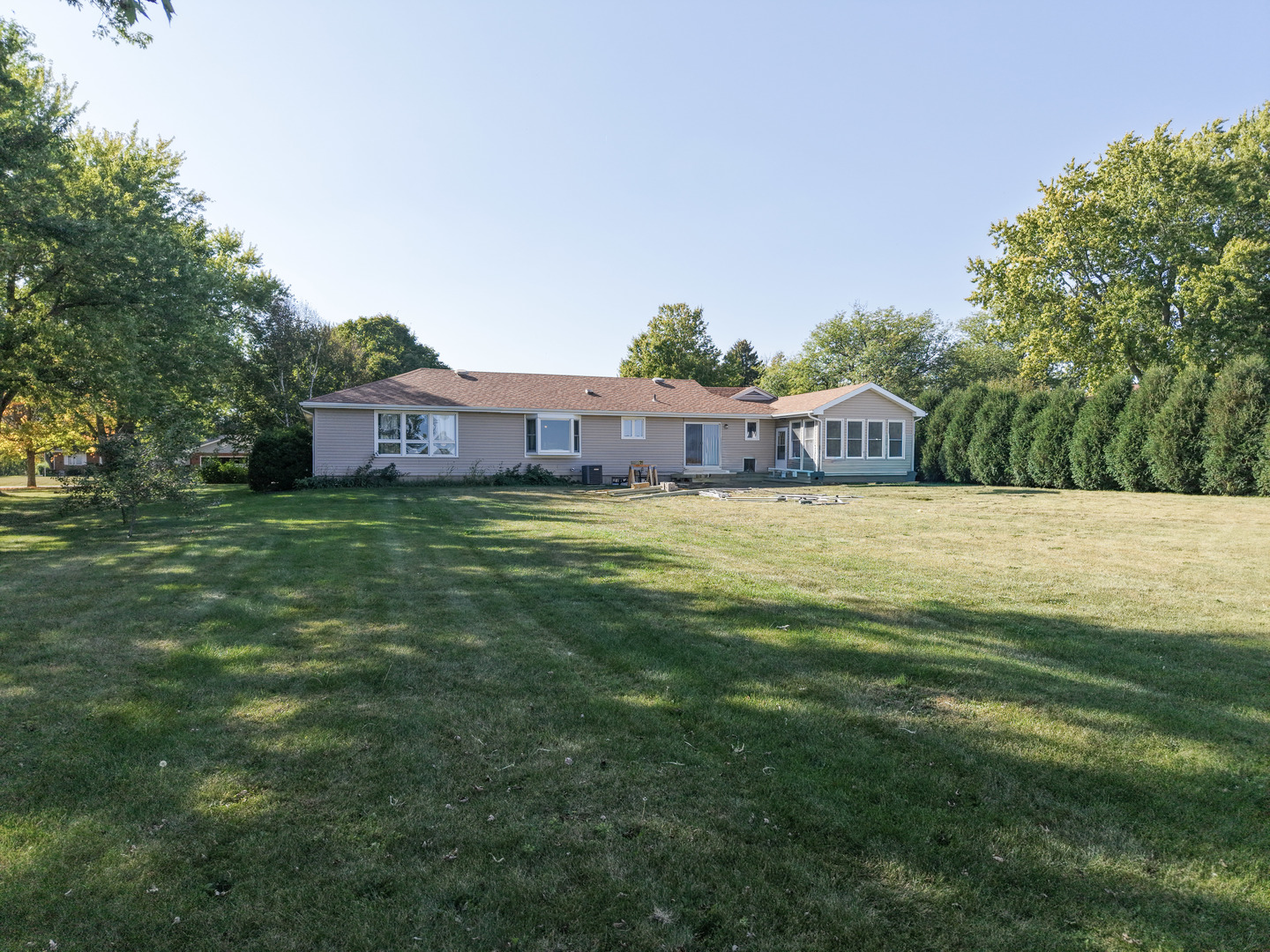 21182 Virginia Road DeKalb, IL 60115 - Photo 37 of 44 a view of a house with a big yard