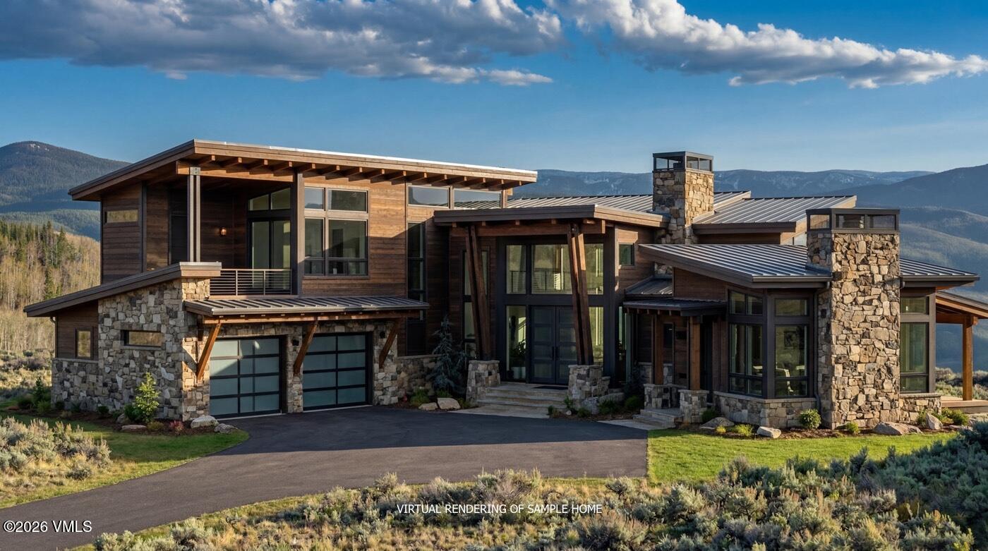 1334 Gore Trail Edwards, CO 81632 - Photo 6 of 26 a front view of a house with a yard