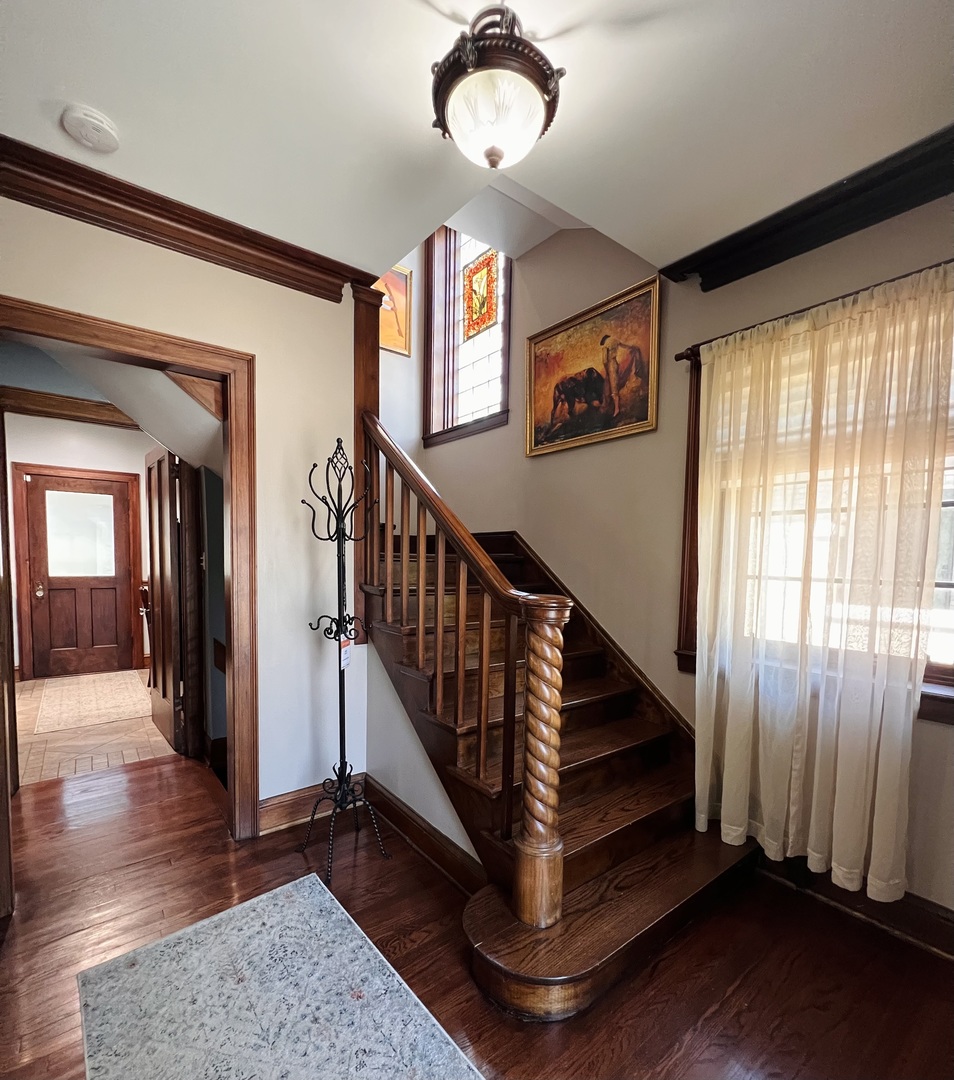 6849 Riverside Drive Berwyn, IL 60402 - Photo 13 of 33 a view of entryway and hall with wooden floor