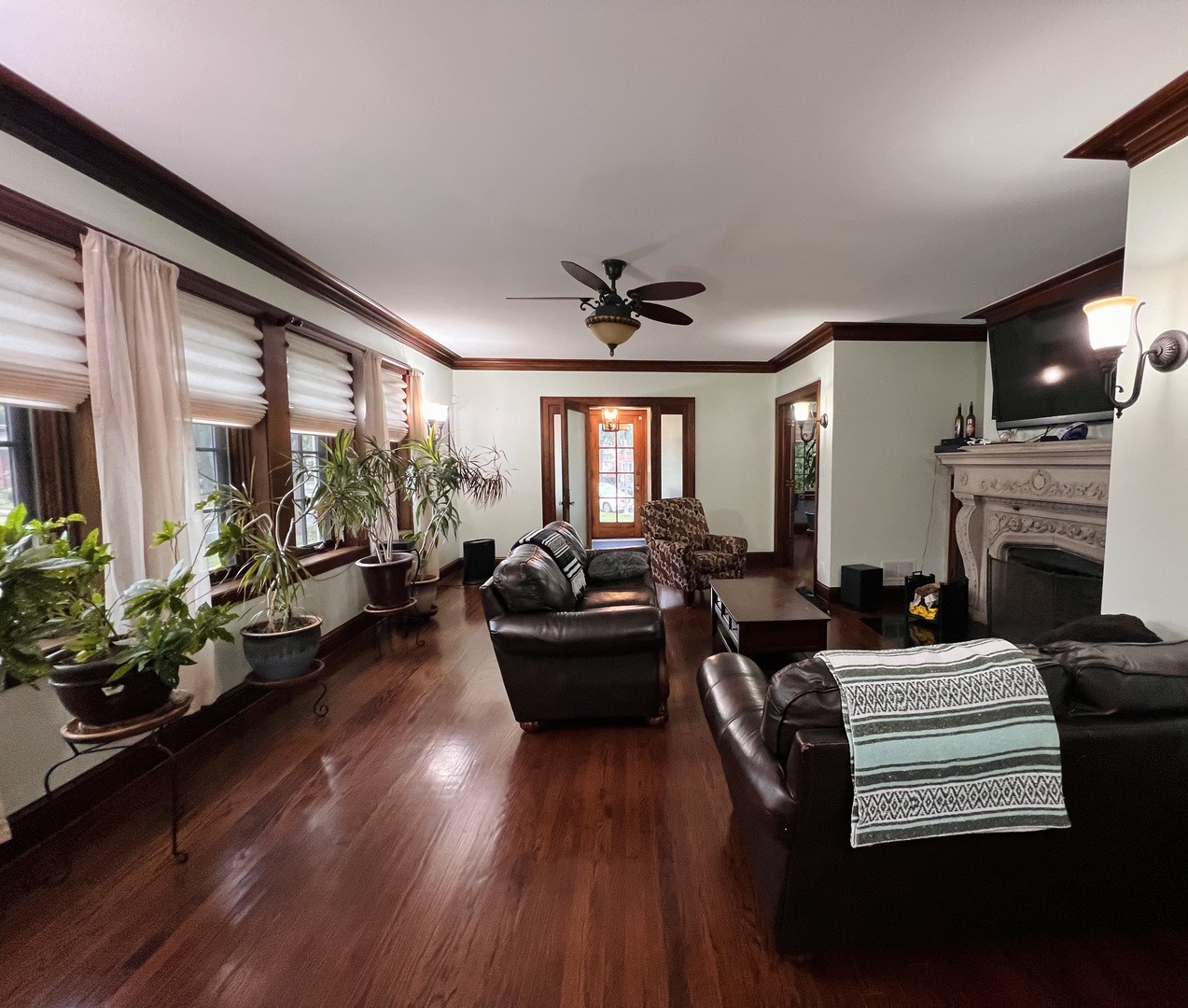 6849 Riverside Drive Berwyn, IL 60402 - Photo 7 of 33 a living room with furniture and a fireplace