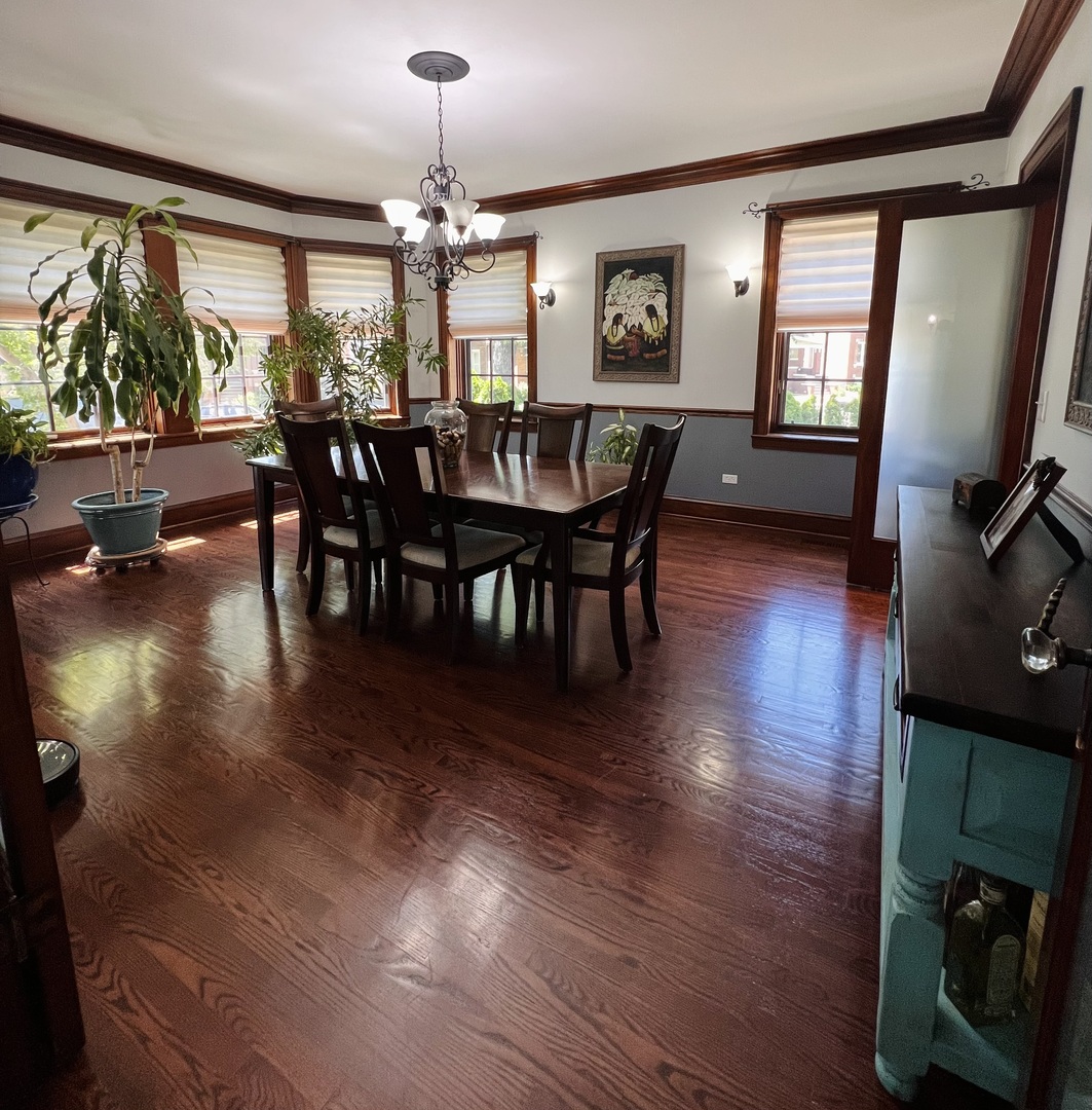 6849 Riverside Drive Berwyn, IL 60402 - Photo 8 of 33 a view of a dining room with furniture window and wooden floor