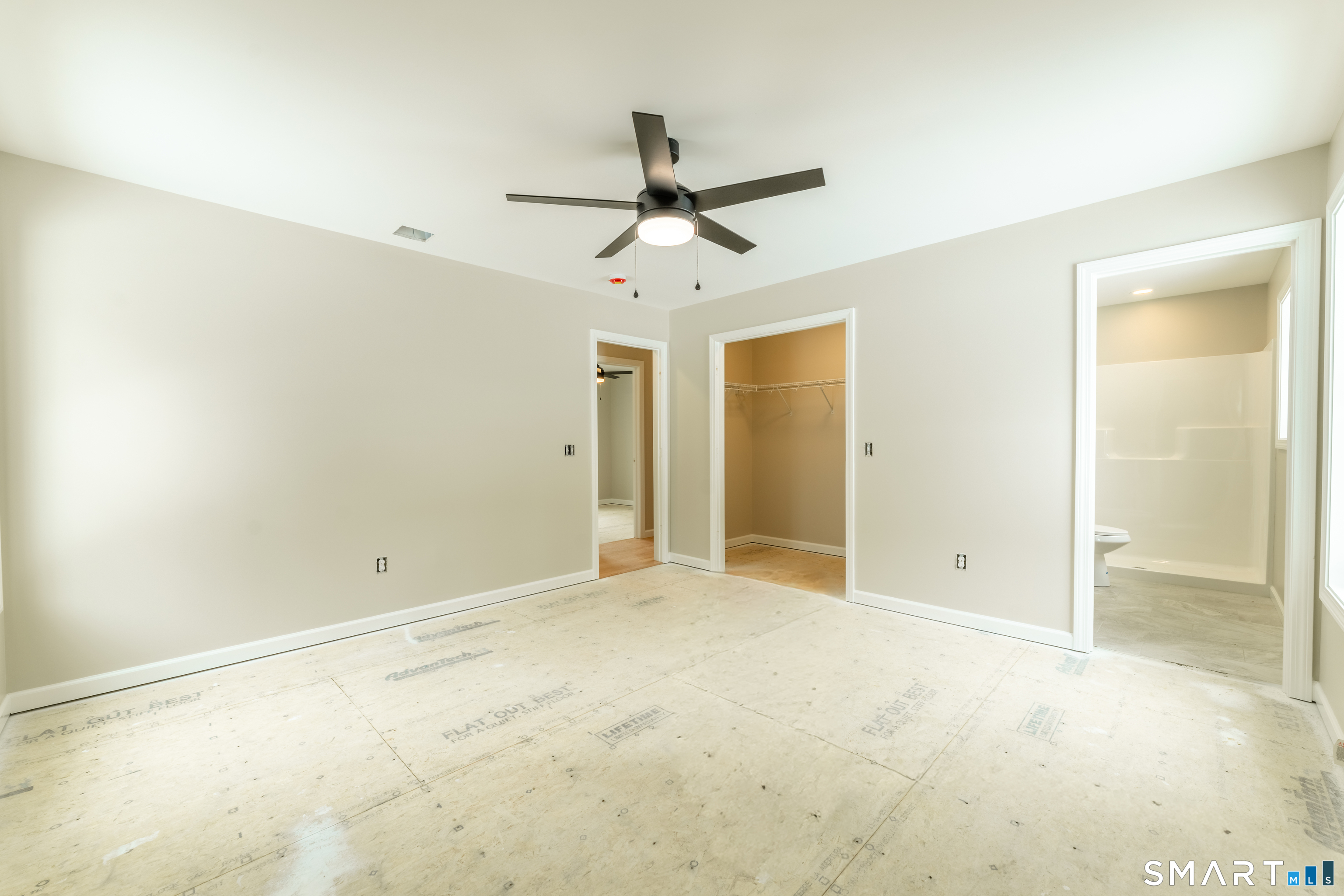 7 Halls Mill Road Preston, CT 06365 - Photo 12 of 26 an empty room with closet and a chandelier fan