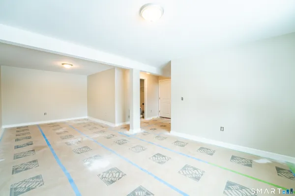 a view of a bedroom with a bed