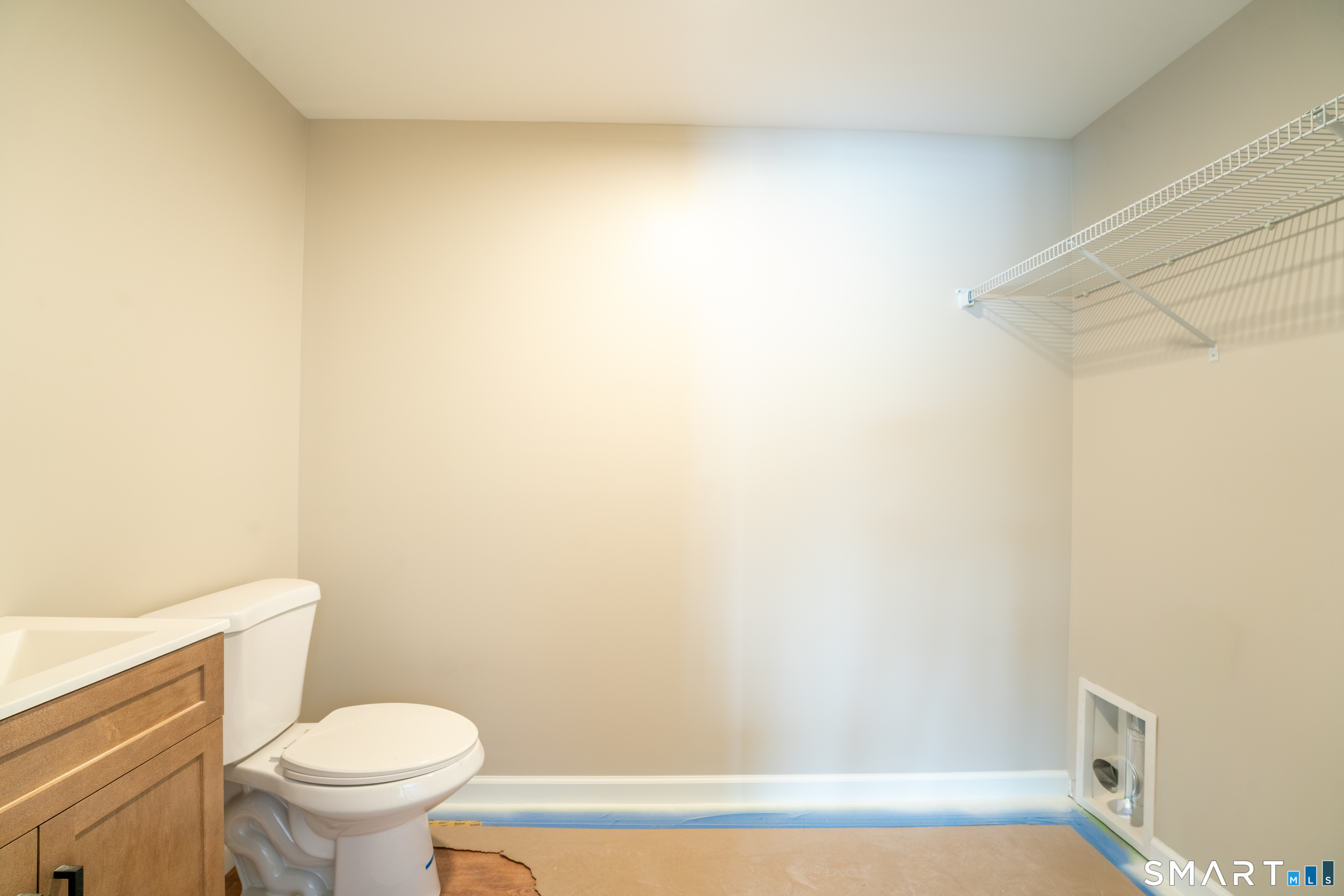 7 Halls Mill Road Preston, CT 06365 - Photo 24 of 26 a white toilet sitting next to a white wall