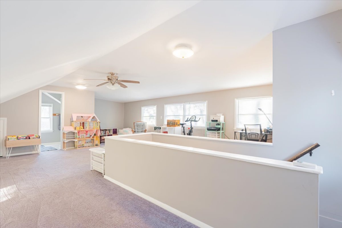 27 University Court Normal, IL 61761 - Photo 17 of 29 a living room with furniture and a large window