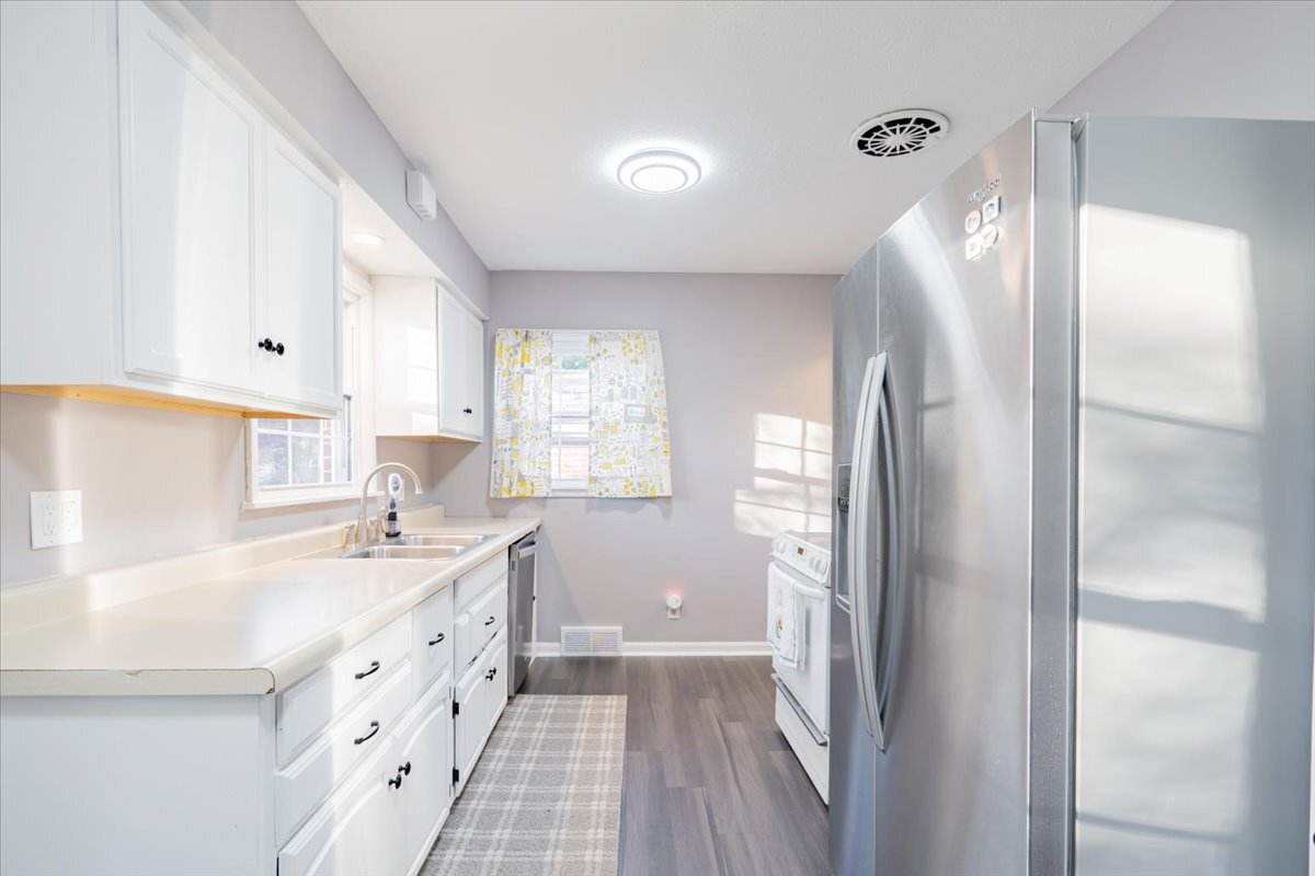 27 University Court Normal, IL 61761 - Photo 8 of 29 a kitchen with stainless steel appliances a refrigerator sink and cabinets