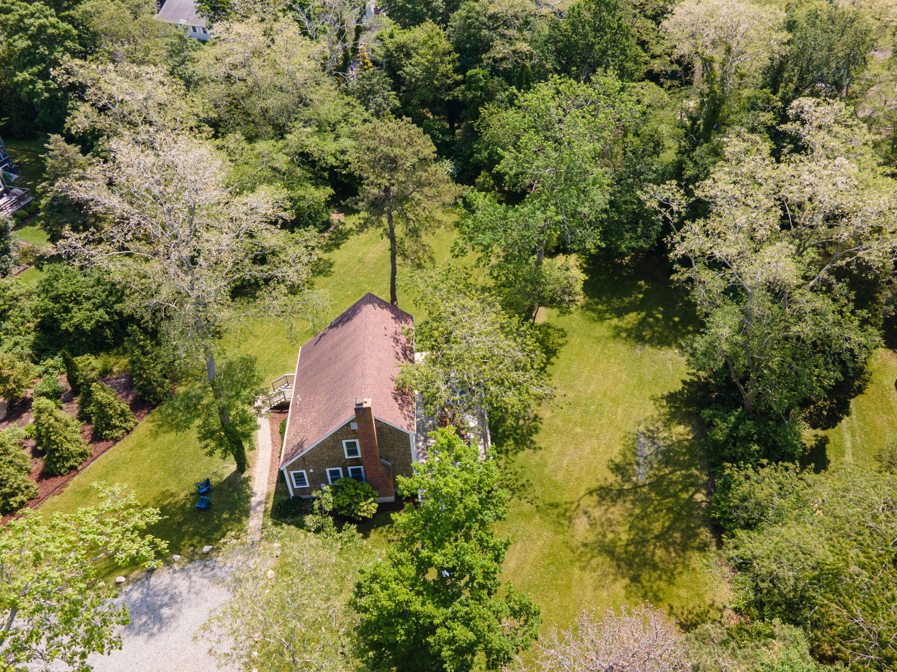 29 Pilgrim Road Dennis, MA 02638 - Photo 11 of 54 a view of a house with a yard
