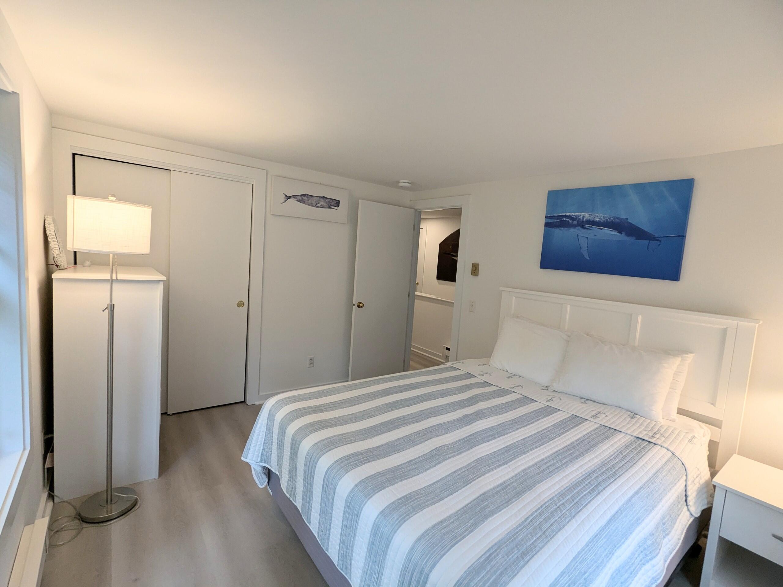 29 Pilgrim Road Dennis, MA 02638 - Photo 24 of 54 a bedroom with a bed and a window