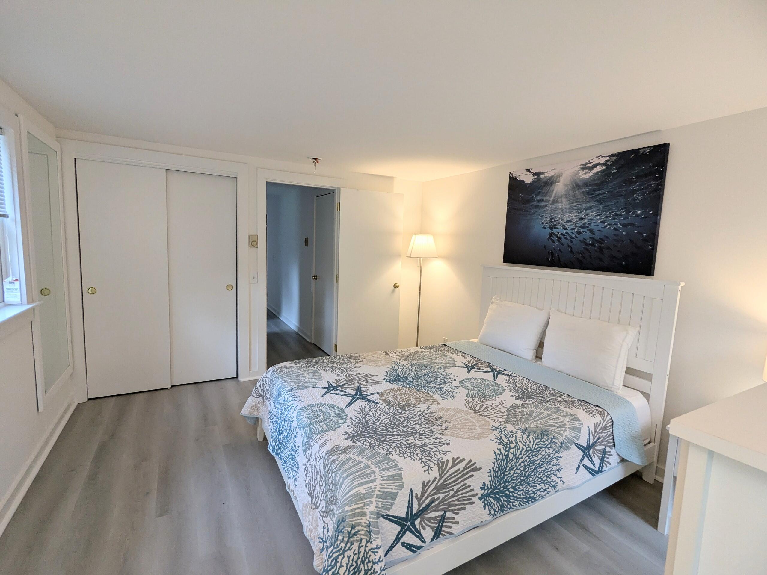 29 Pilgrim Road Dennis, MA 02638 - Photo 26 of 54 a bedroom with a bed and a flat screen tv