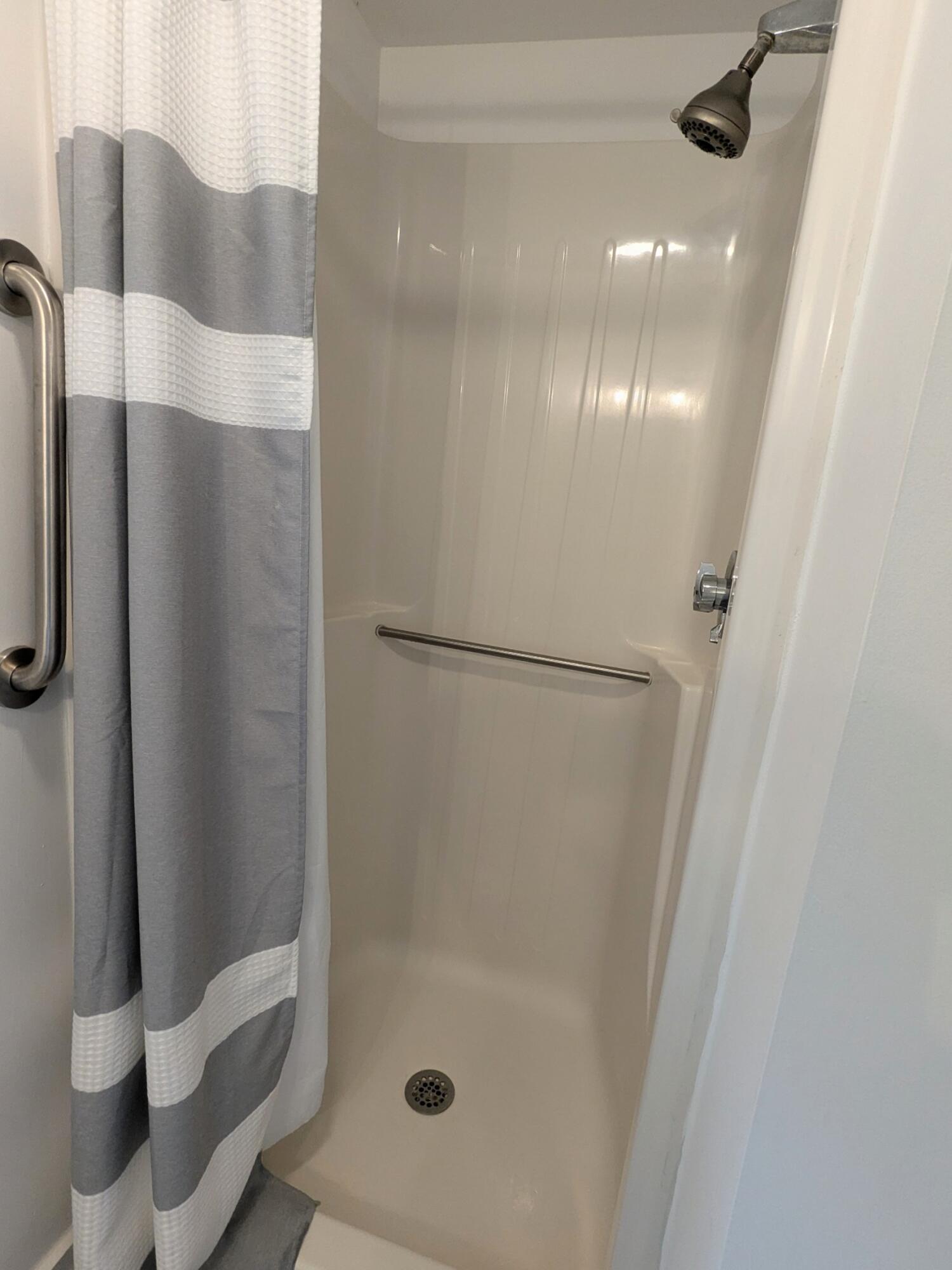 29 Pilgrim Road Dennis, MA 02638 - Photo 31 of 54 a bathroom with a shower