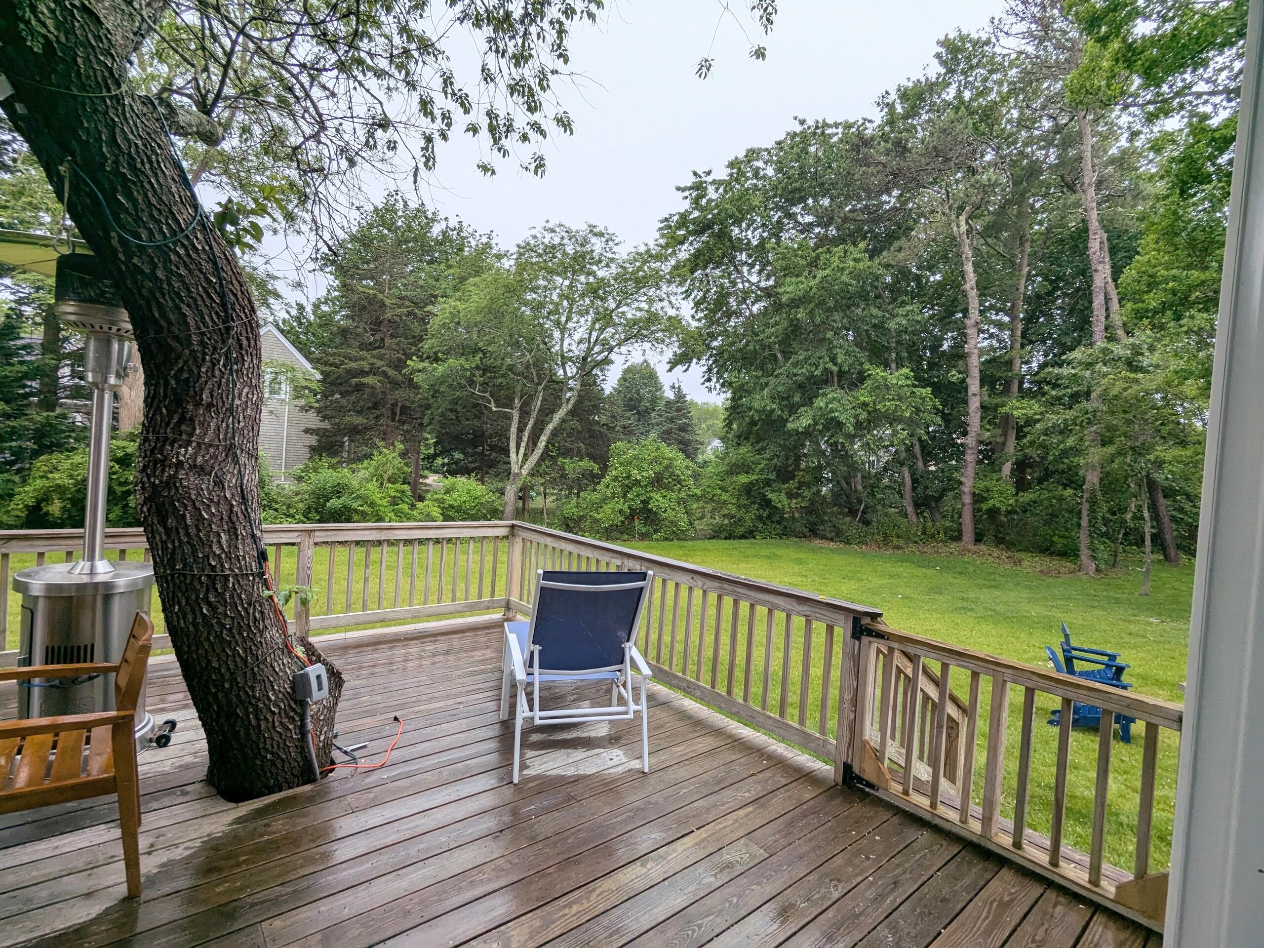 29 Pilgrim Road Dennis, MA 02638 - Photo 34 of 54 a view of balcony with wooden floor and outdoor seating
